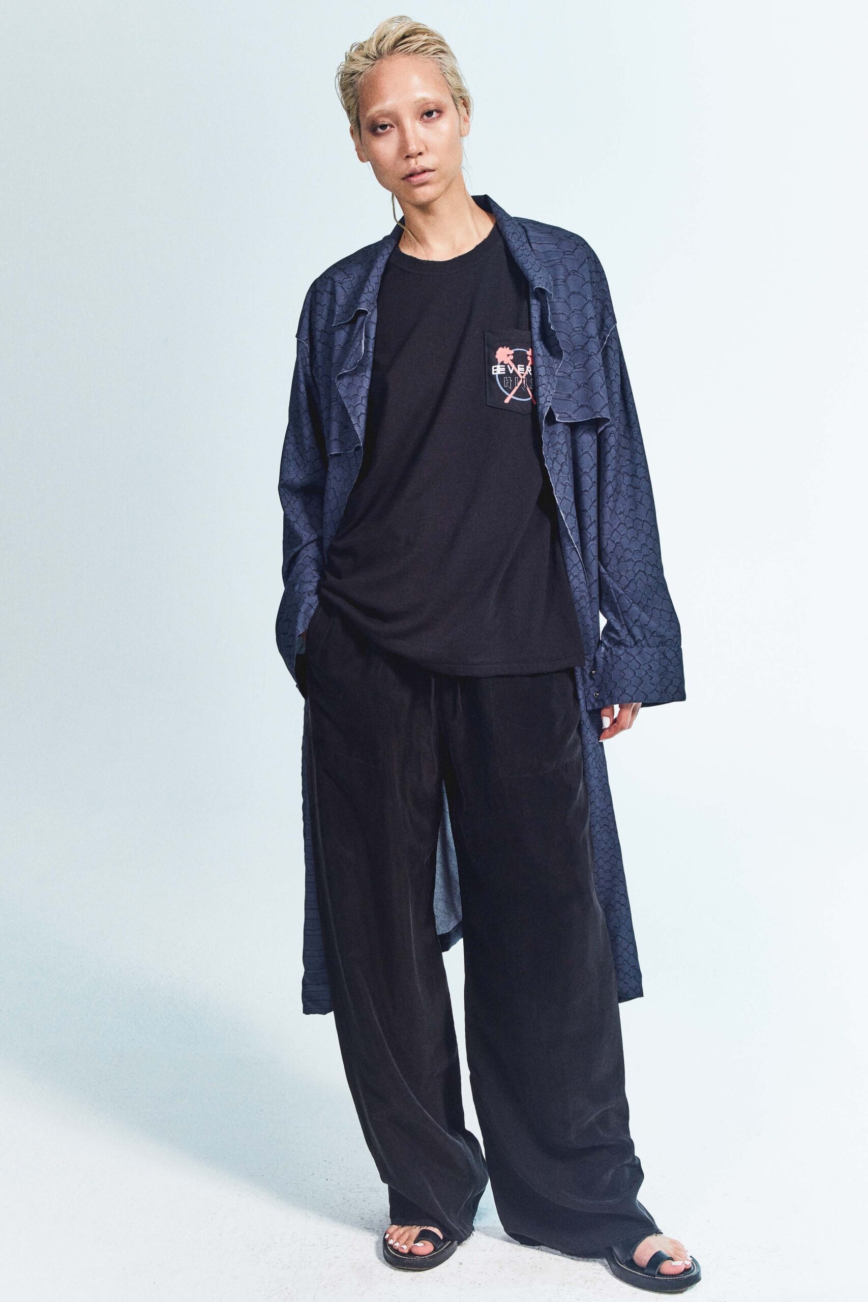 black relaxed shirt with blue coat