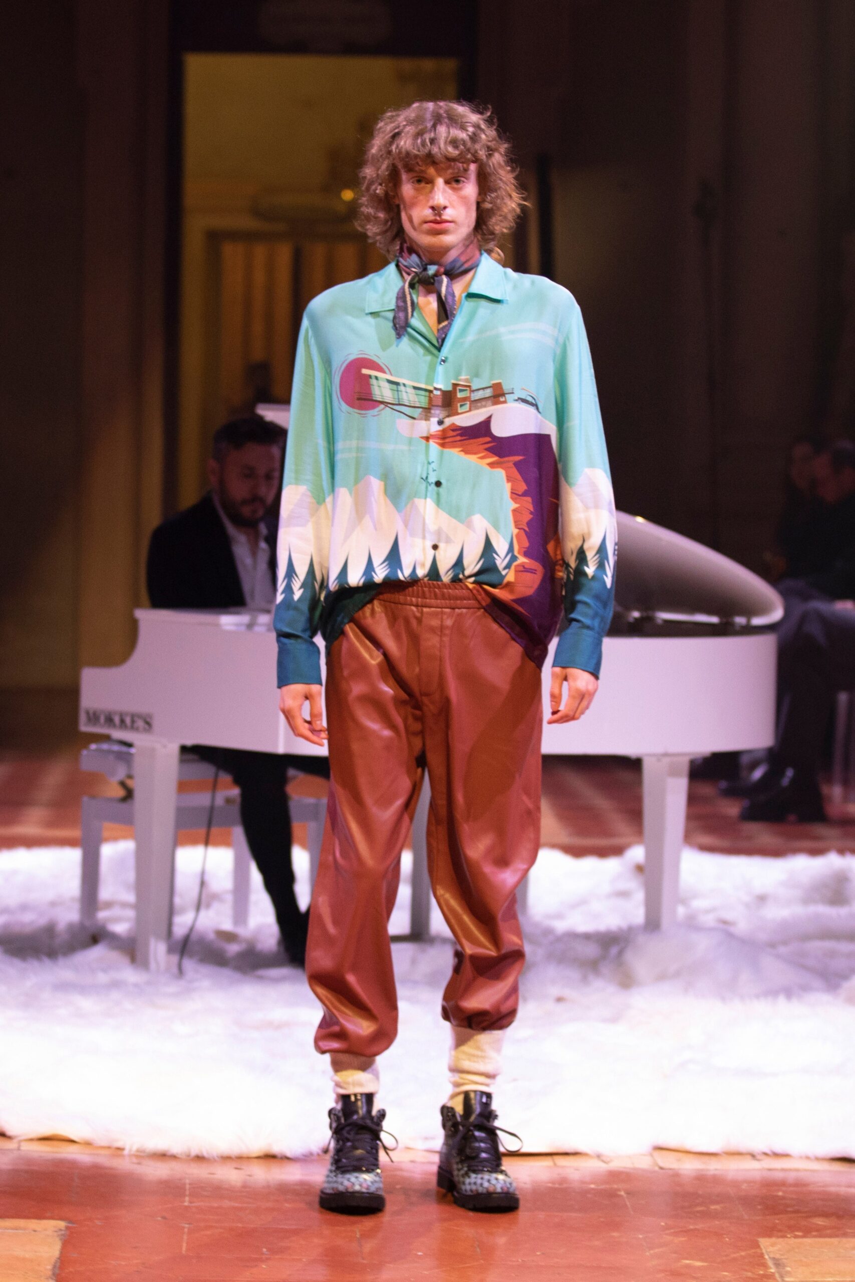 multi-colored silk shirt and brown leather pants