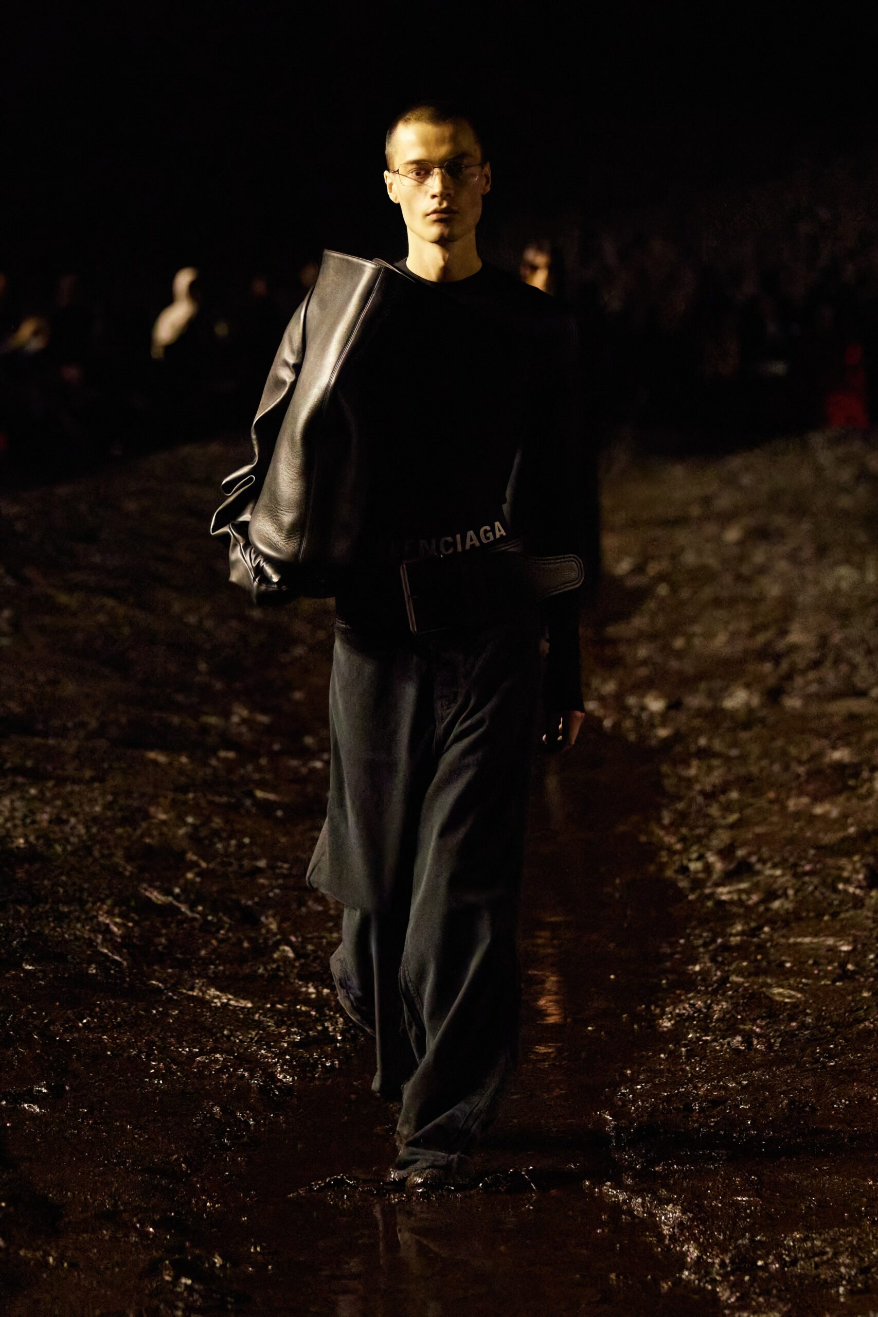 black leather fitted jacket and relaxed pants