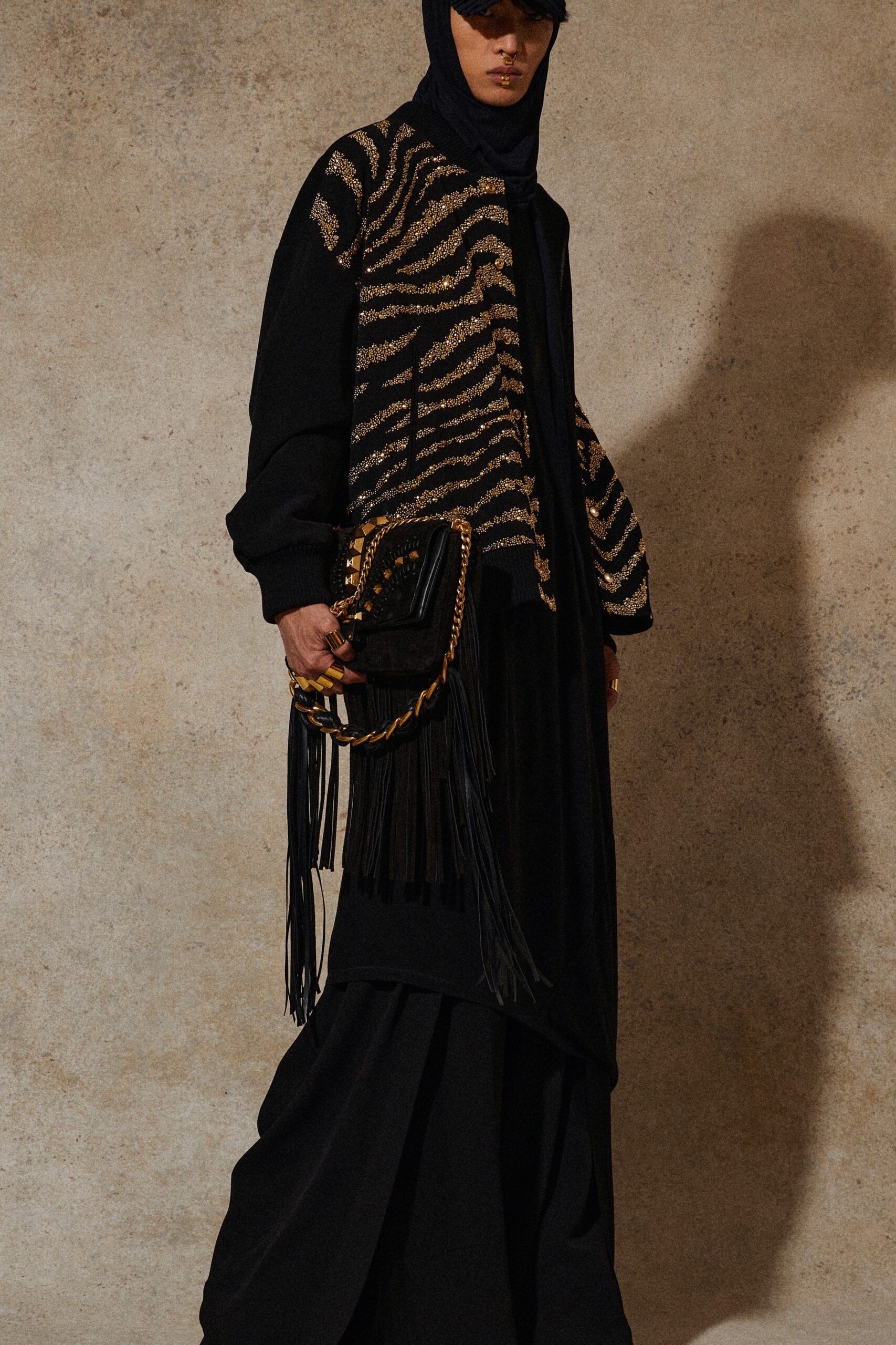 black and gold relaxed top with layered skirt