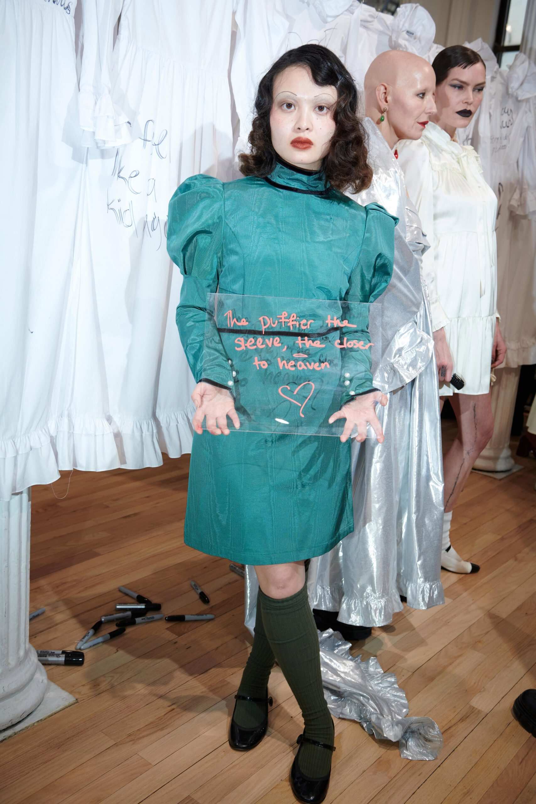 green mini dress with puffed sleeves