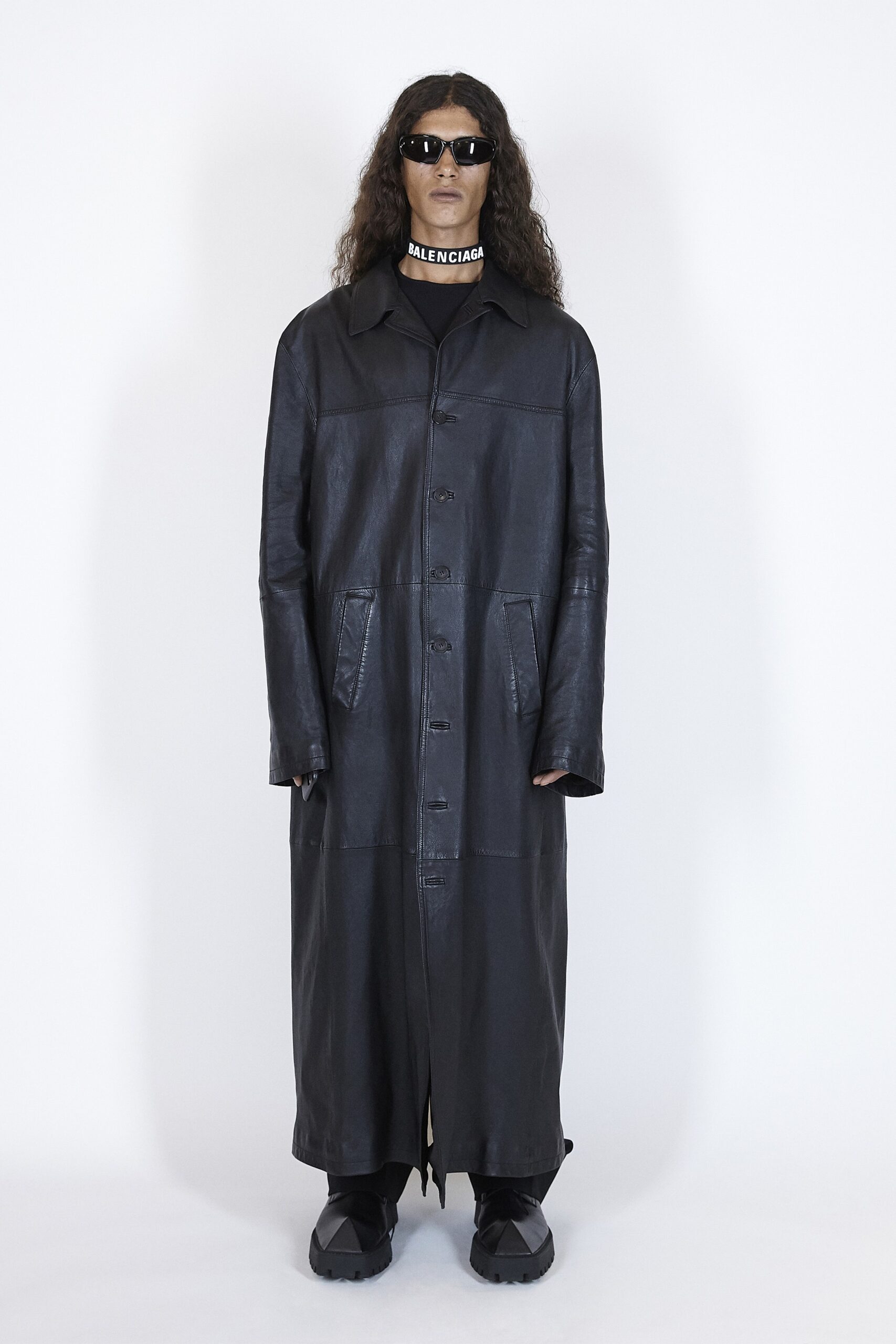black leather long-sleeve collared relaxed buttoned pockets coat
