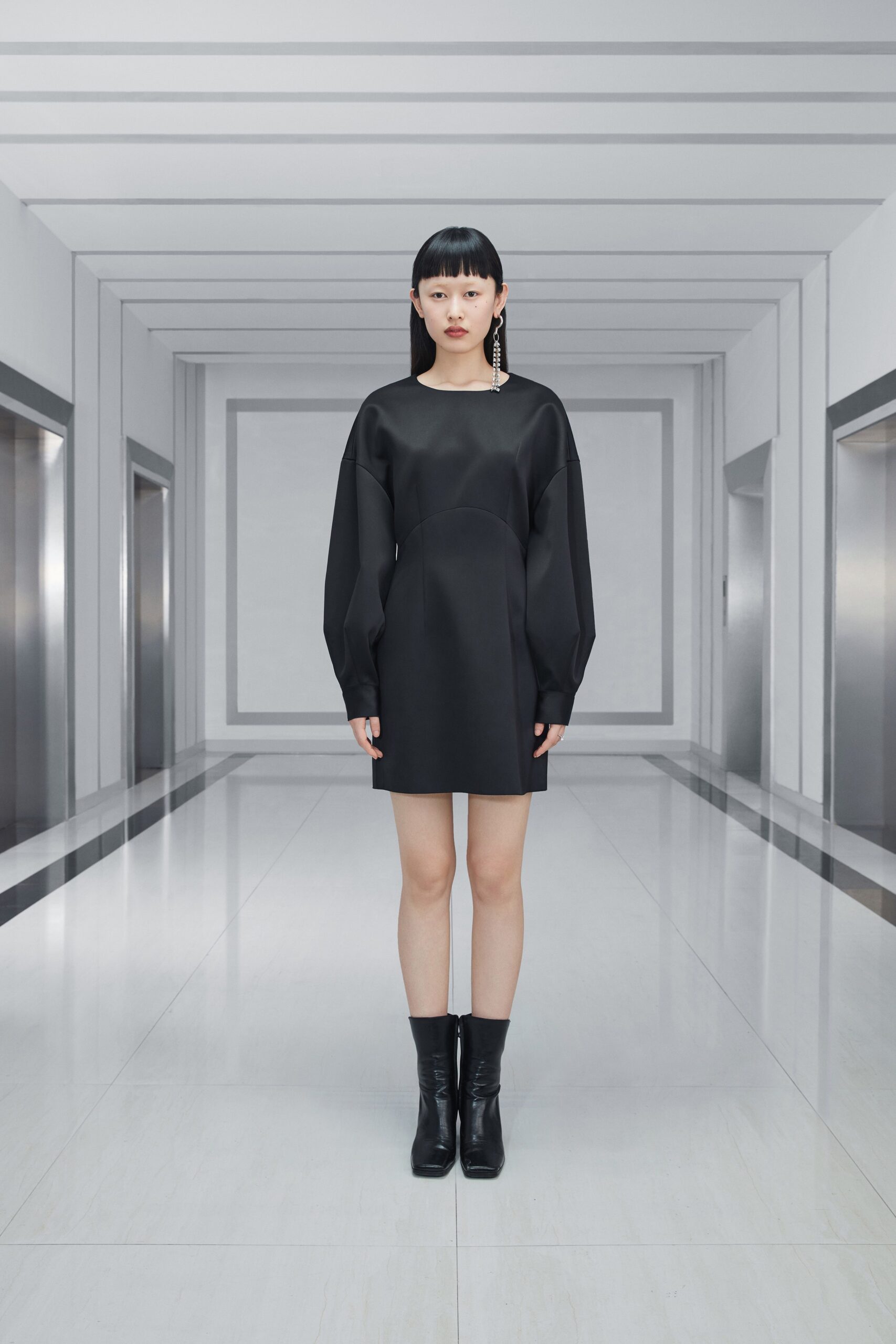 black relaxed mini dress with boots