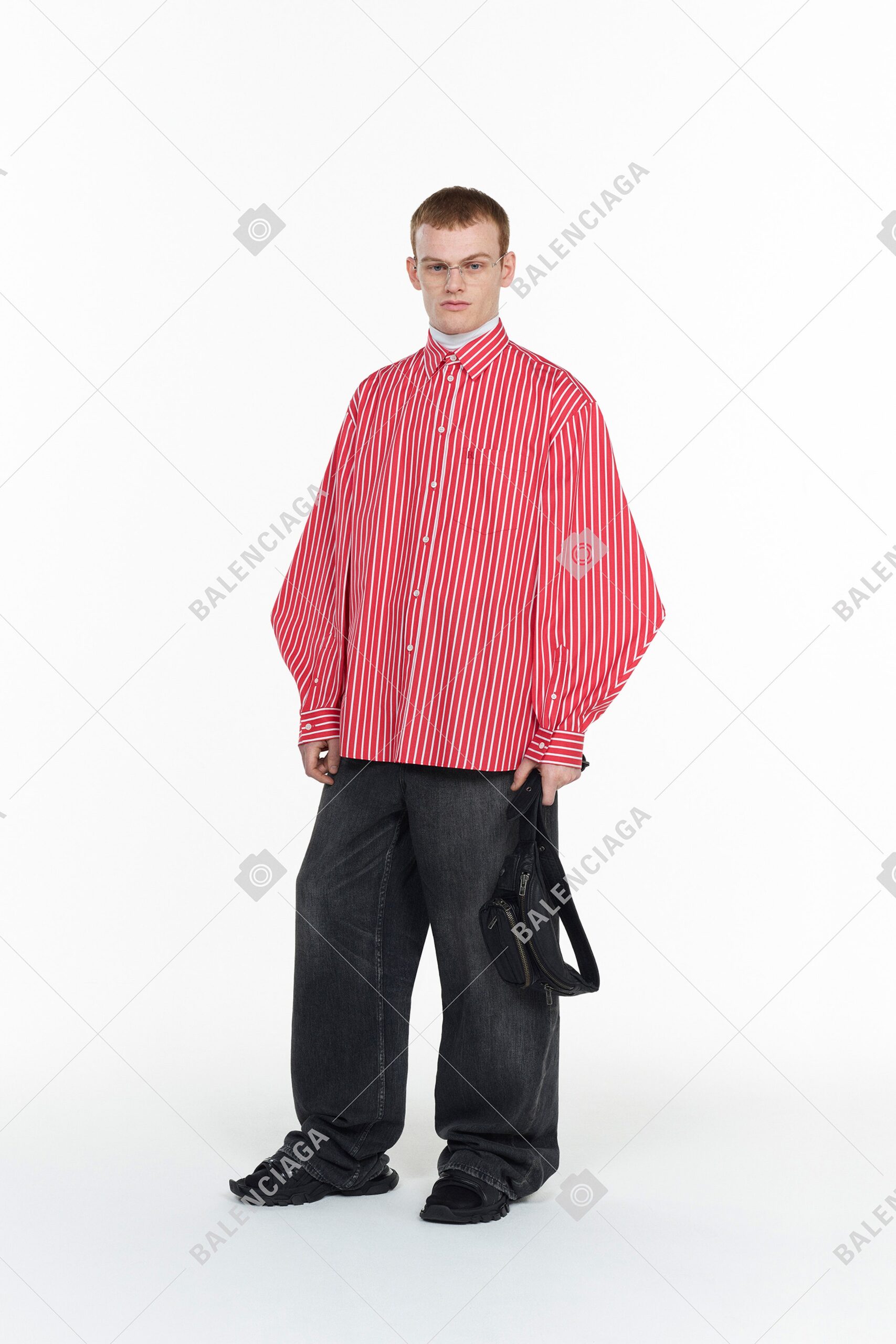 oversized striped shirt and relaxed pants