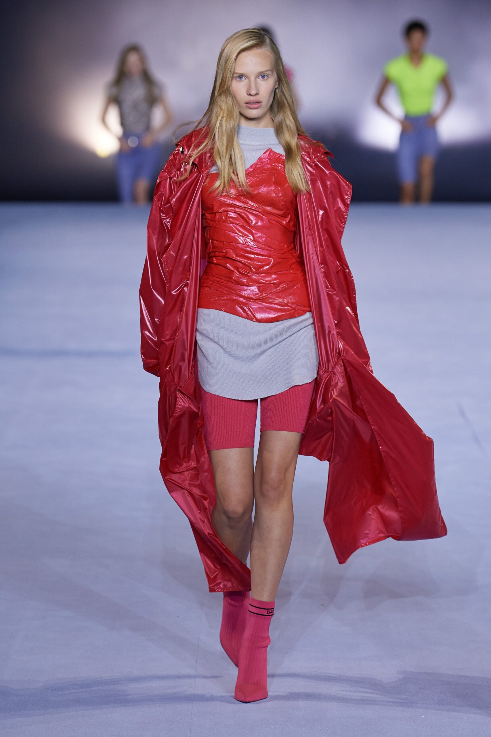 red vinyl coat gray dress pink shorts