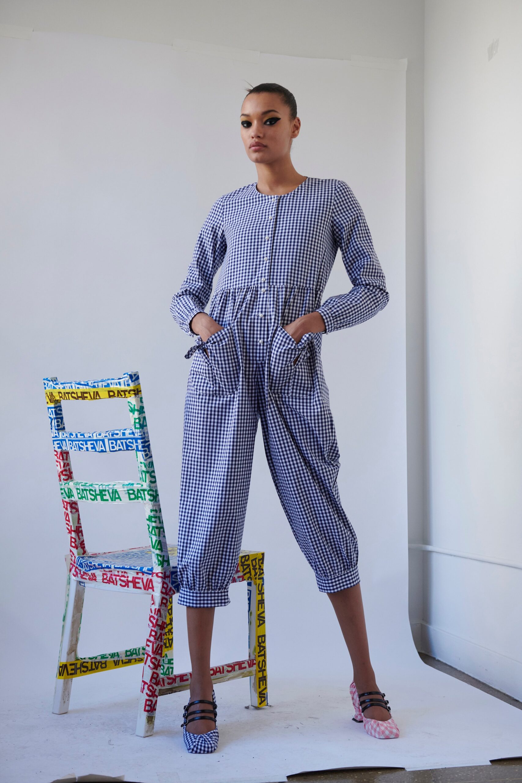 blue and white checked jumpsuit