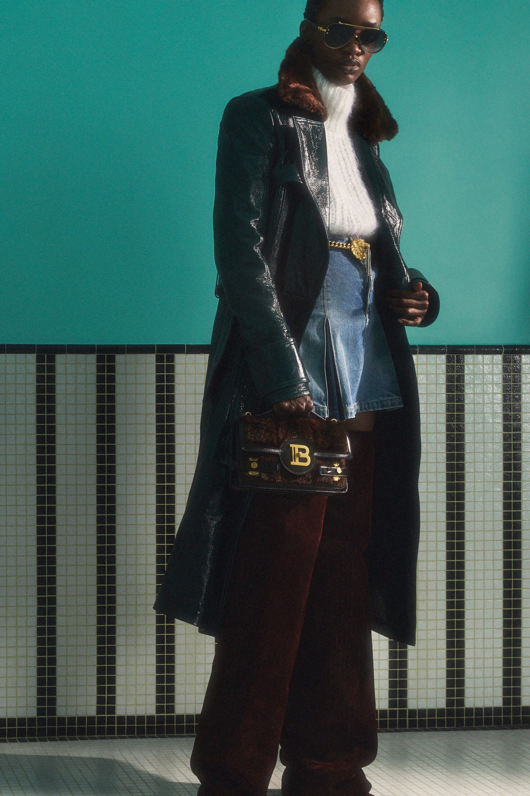 black leather long-sleeve collared fitted belted coat