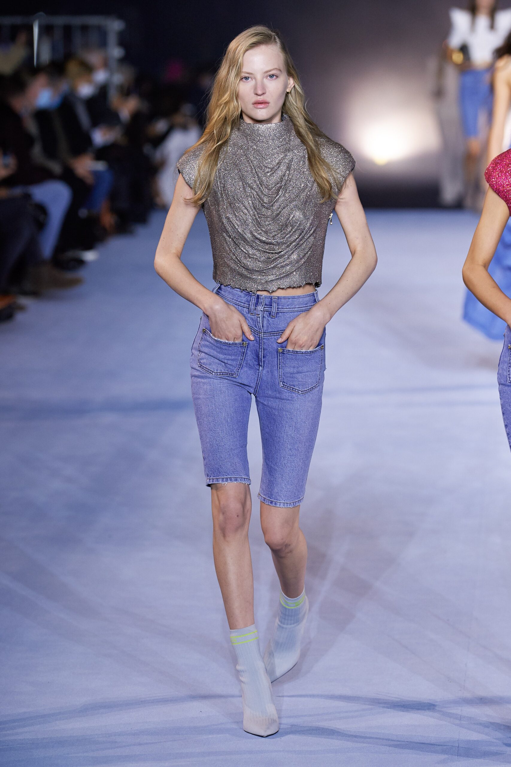 fitted gray metallic top and blue denim shorts
