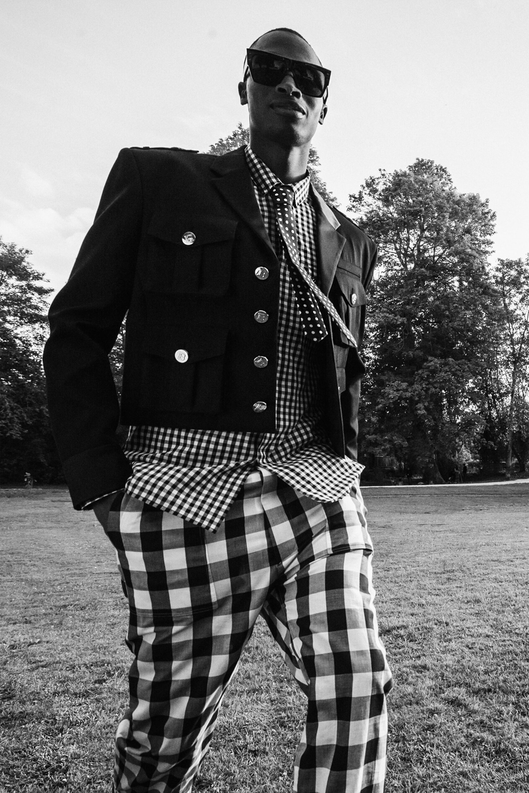 black jacket with checked shirt and pants