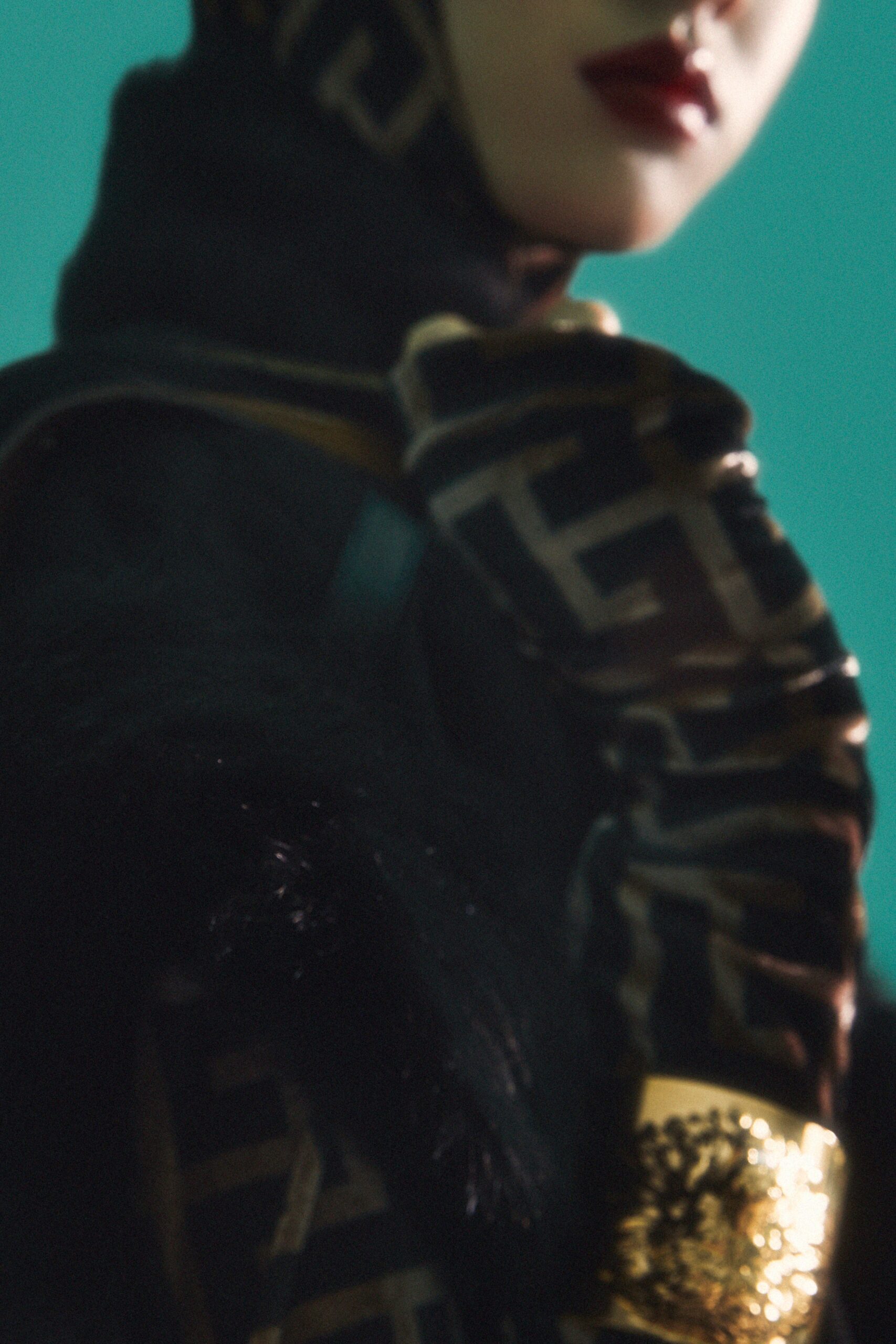 black fur coat with printed scarf