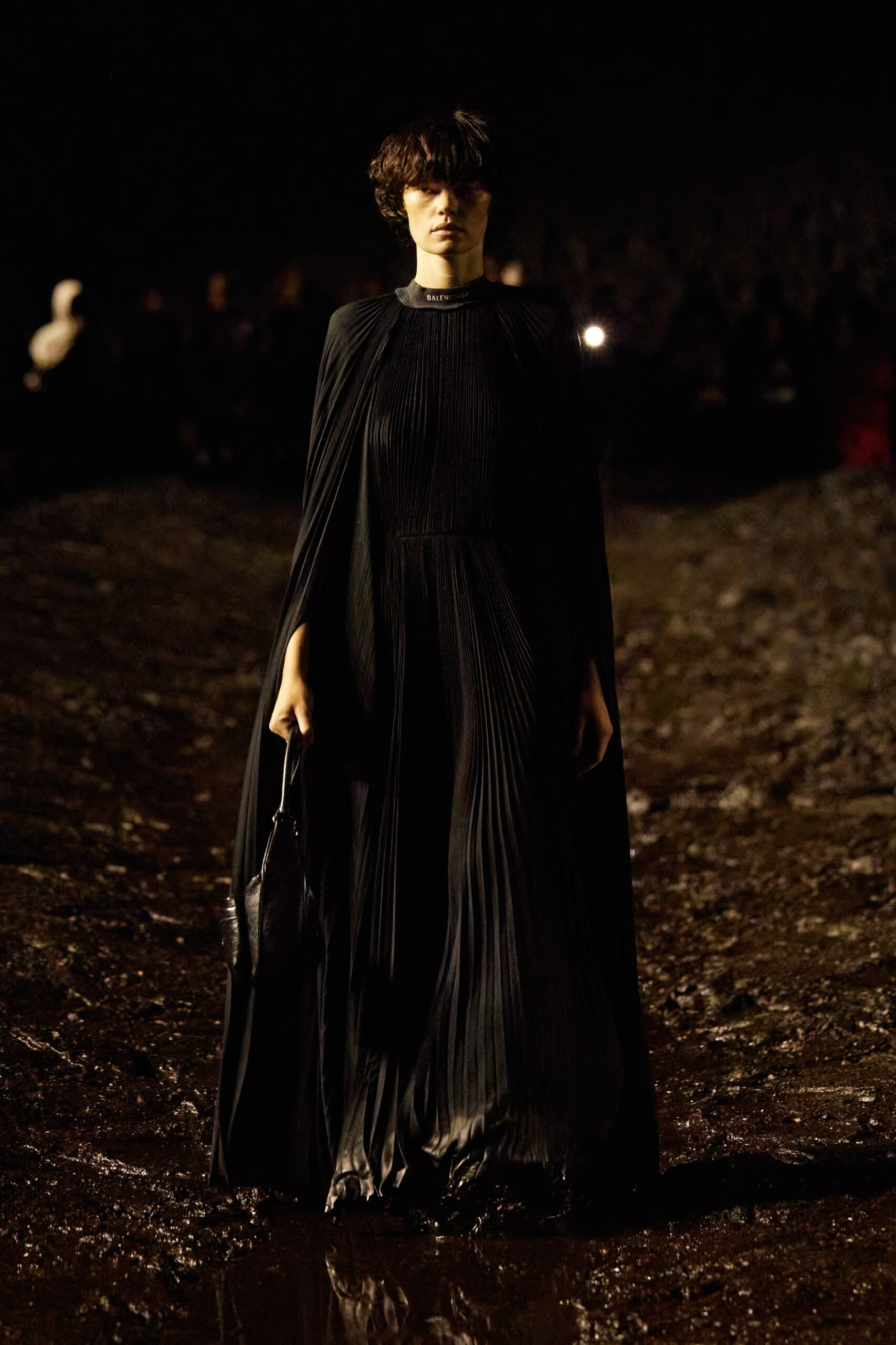 black silk pleated gown with cape