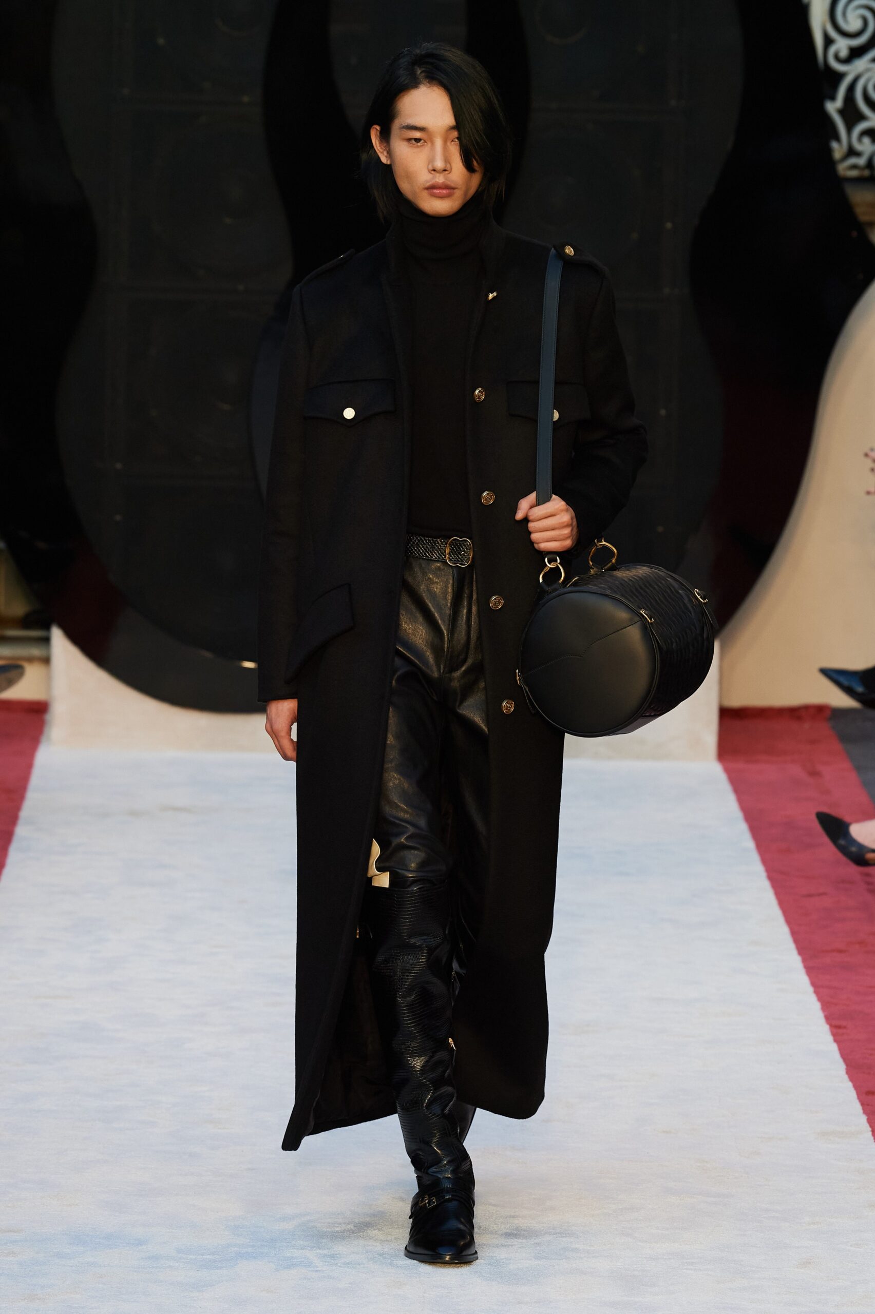 black wool coat with leather pants