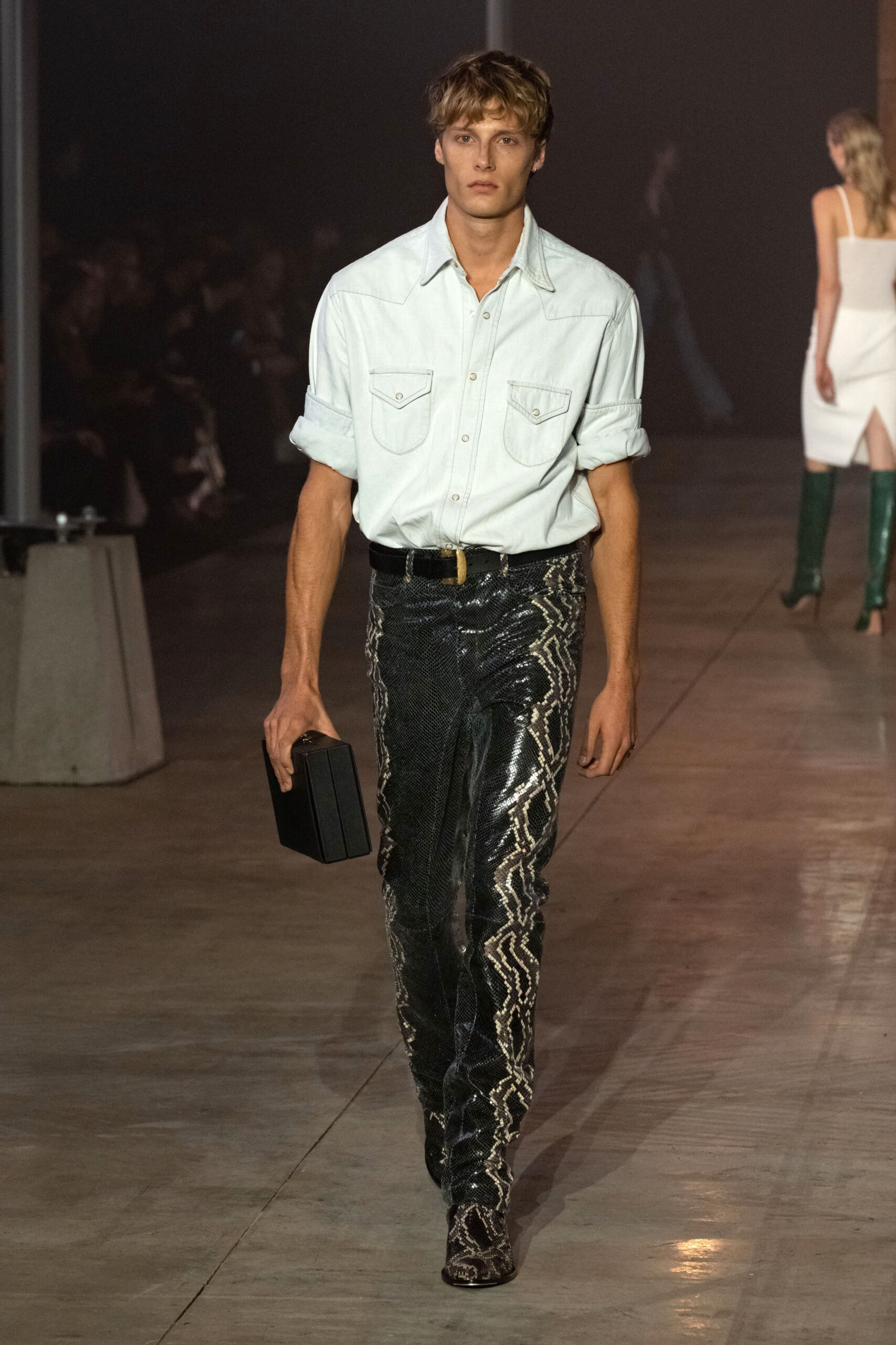 black denim fitted zippered distressed shiny pants