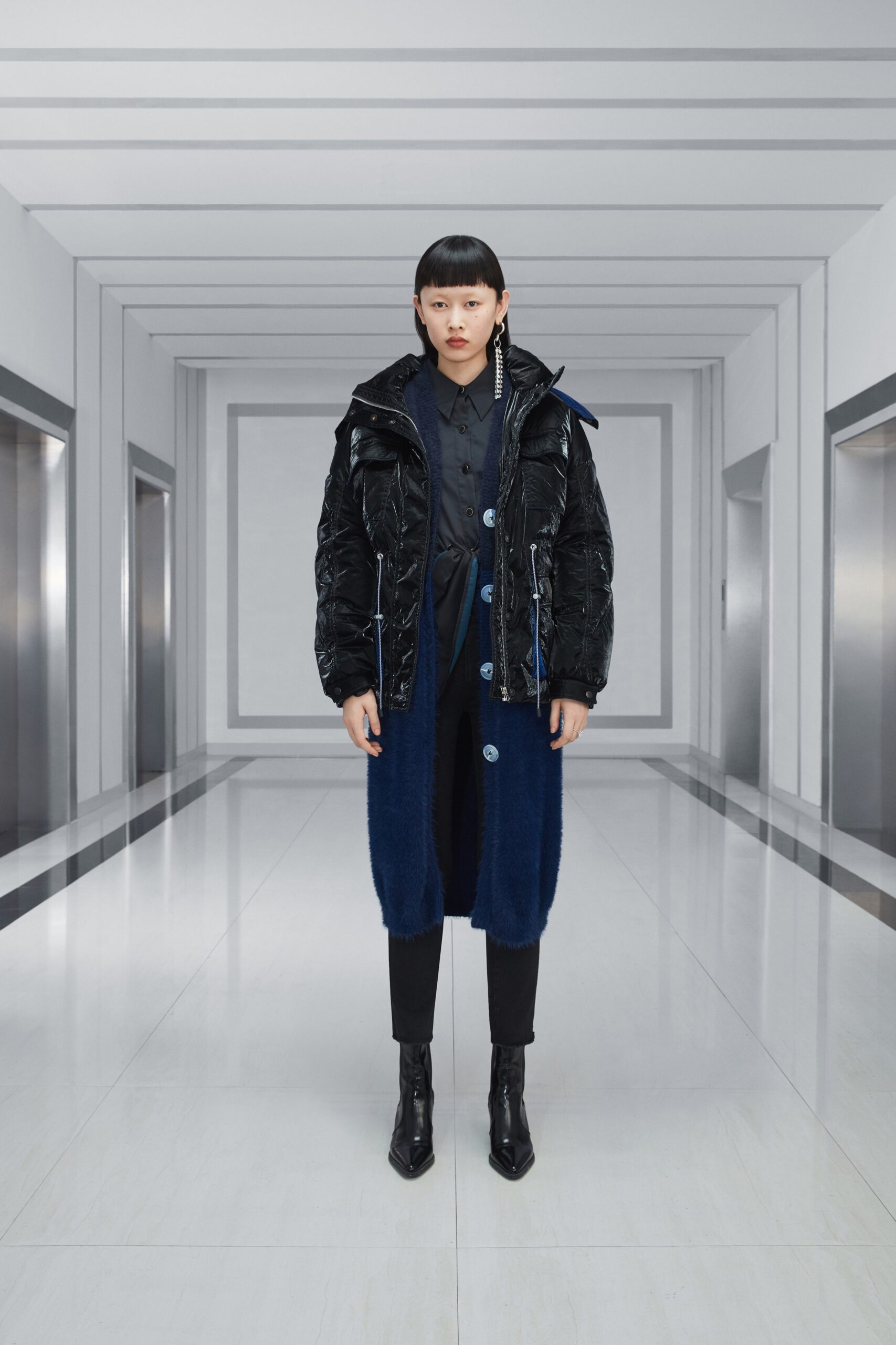 black and blue vinyl coat