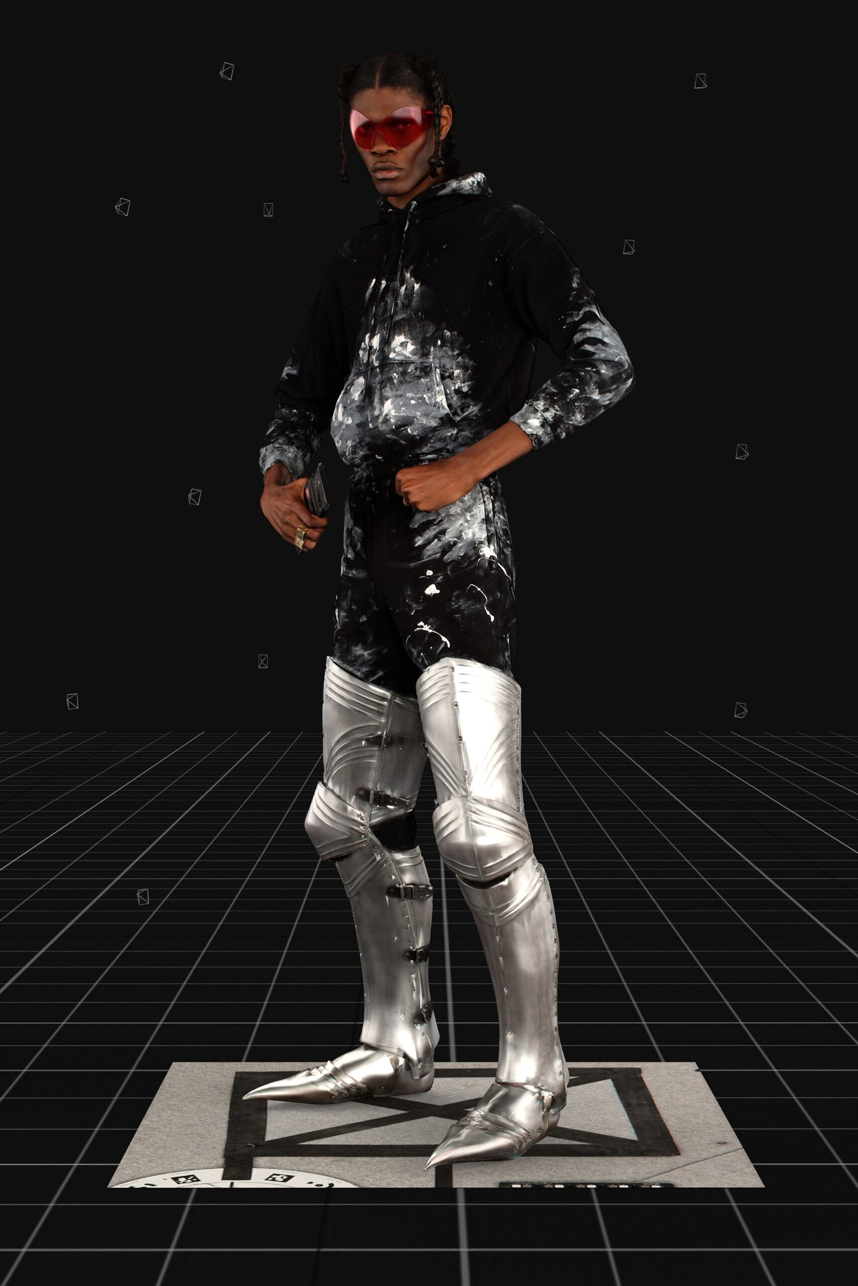 black and white printed hoodie with metallic pants
