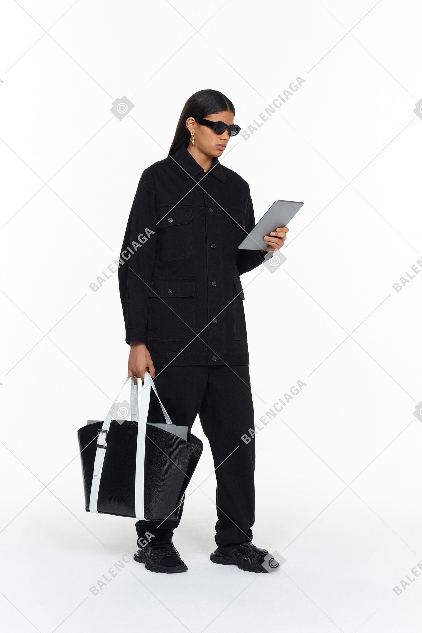 black relaxed jacket and pants outfit