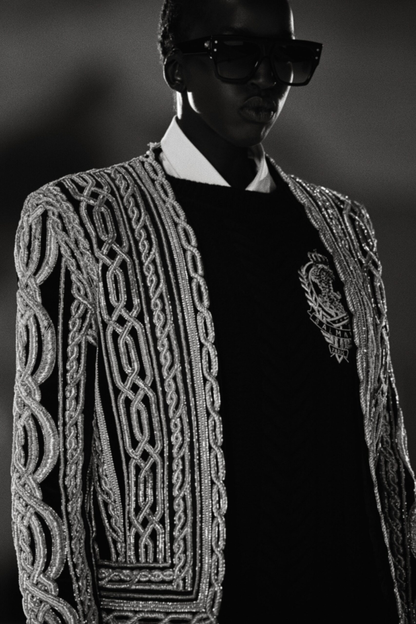 black embroidered jacket and sweater