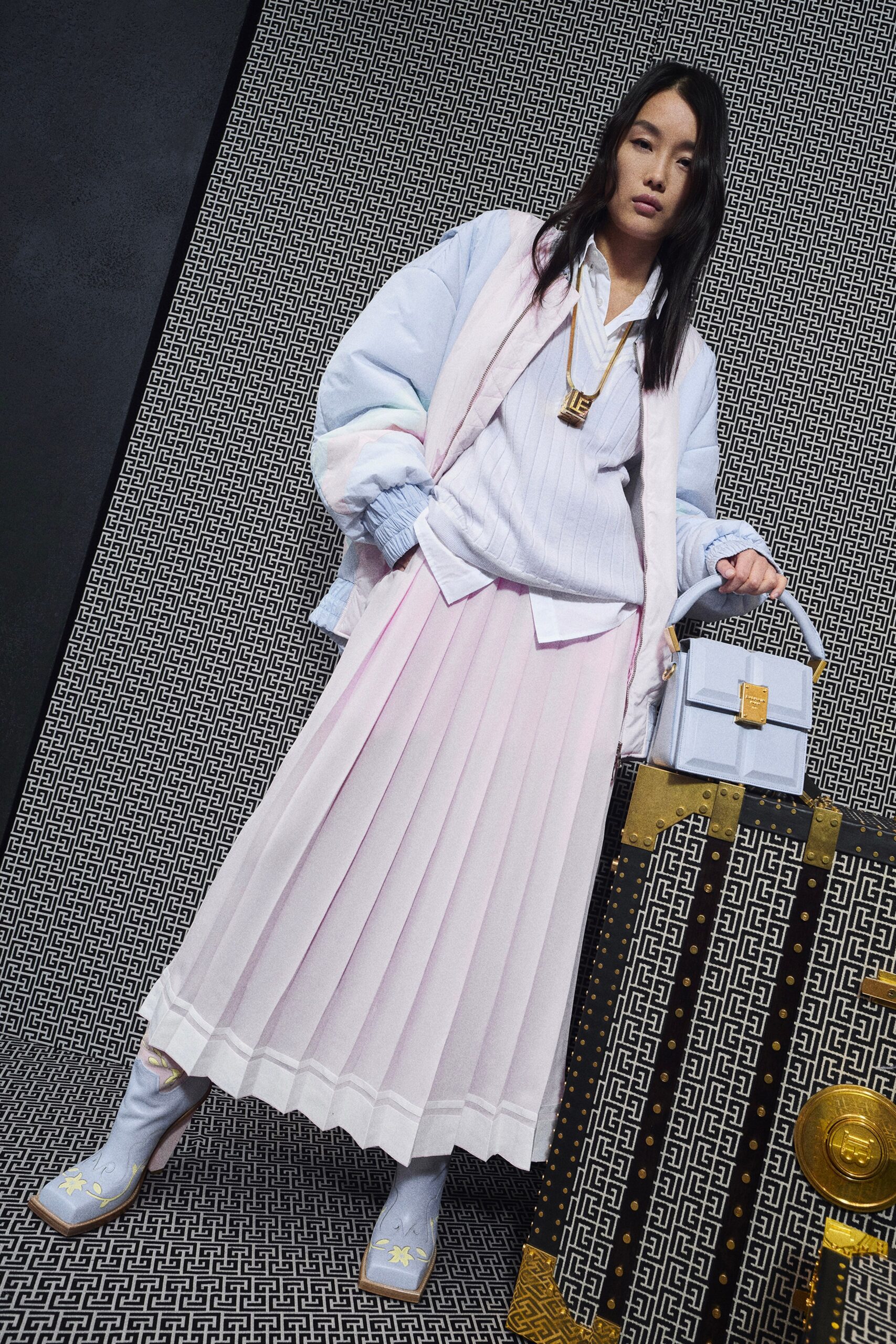 light blue relaxed jacket with pink pleated skirt