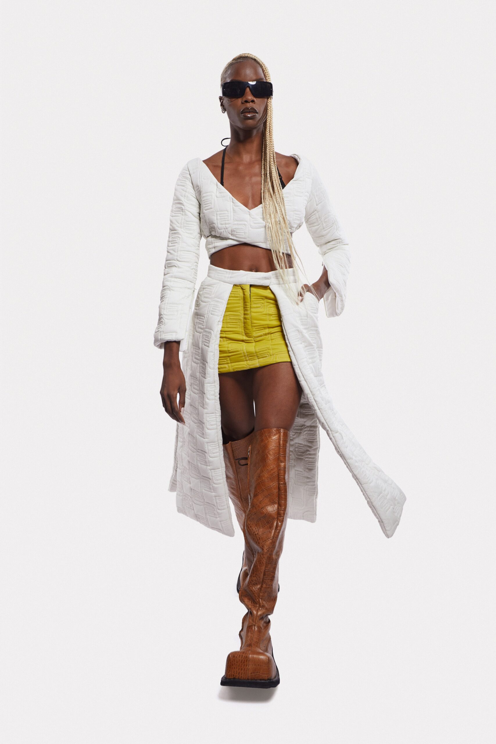 white coat and yellow mini skirt