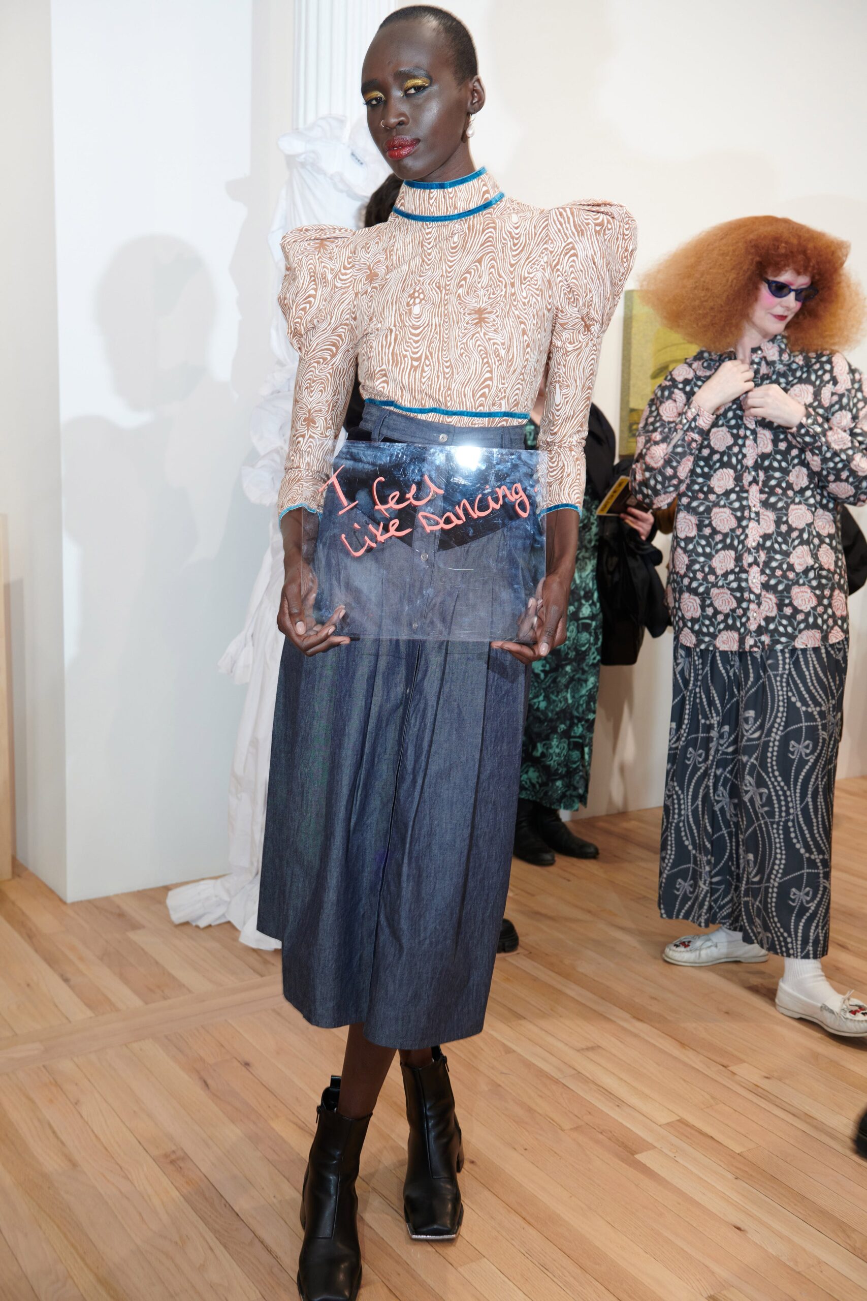 fitted silk blouse and denim skirt