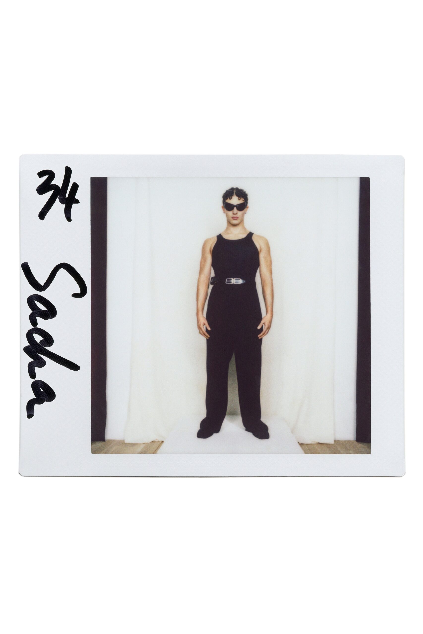 black sleeveless fitted straight-leg jumpsuit