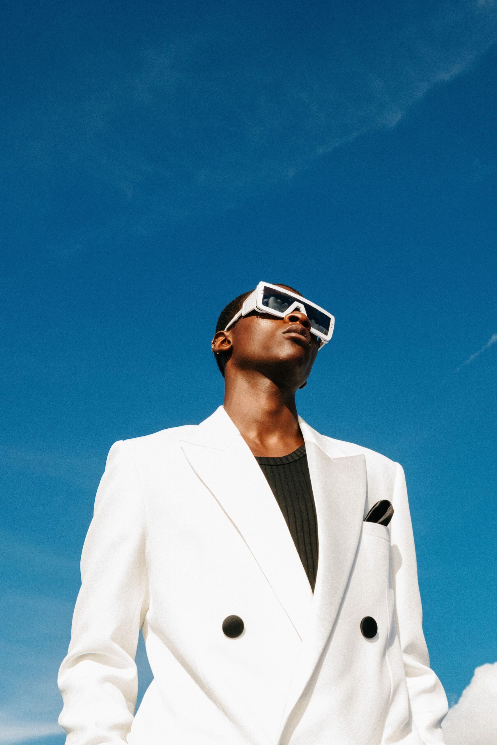 white tailored suit with black top