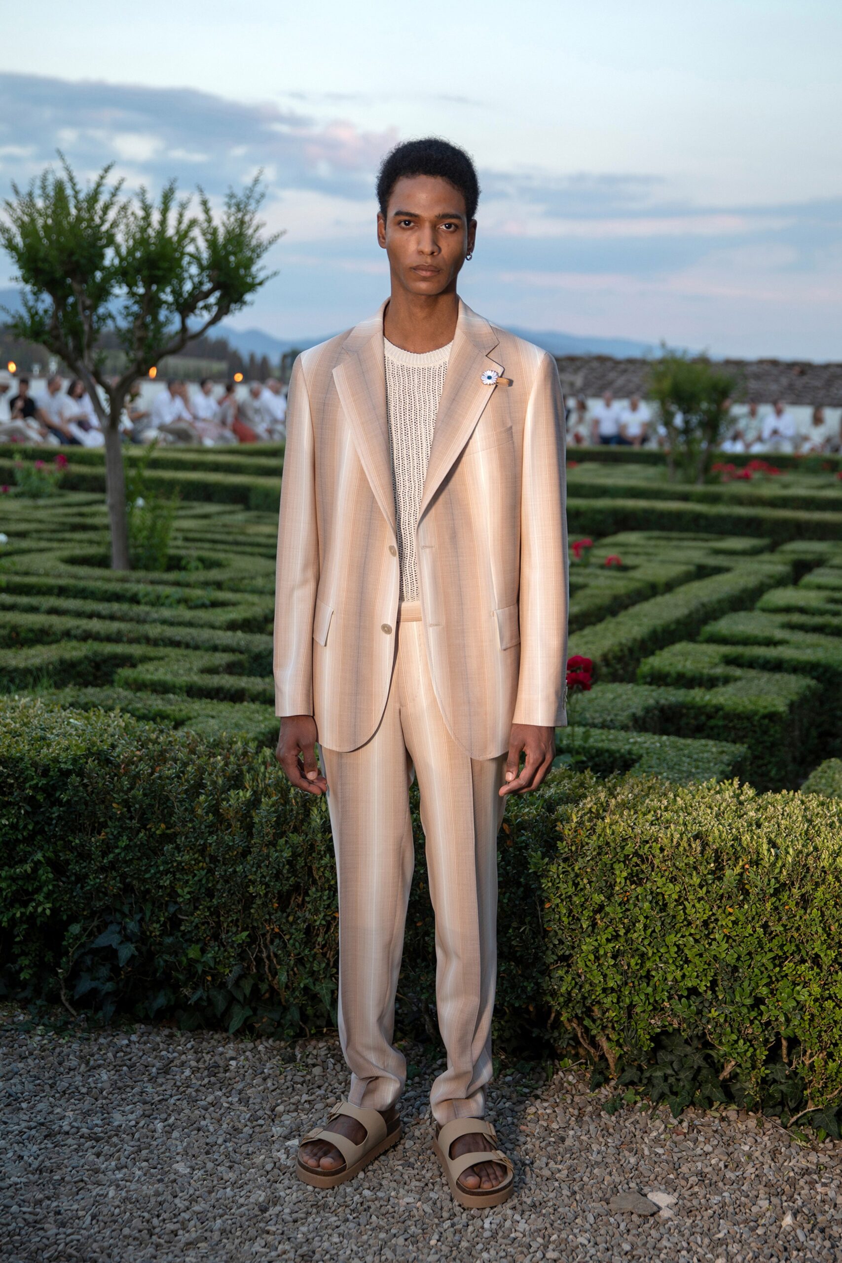 beige tailored suit with white top