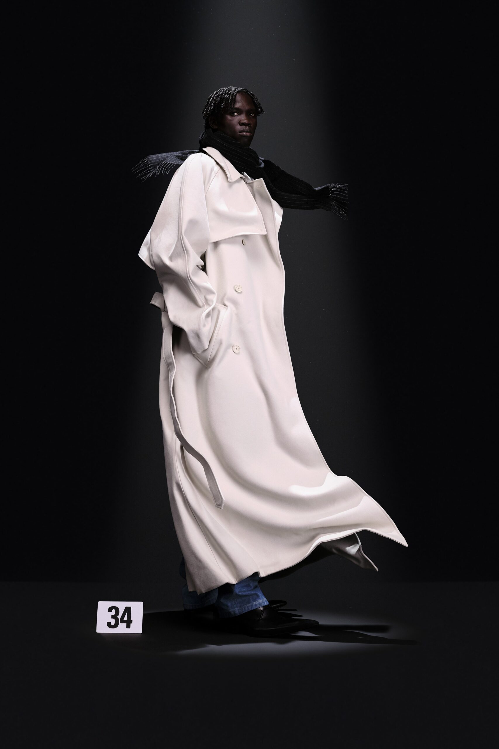 white wool relaxed coat with black scarf