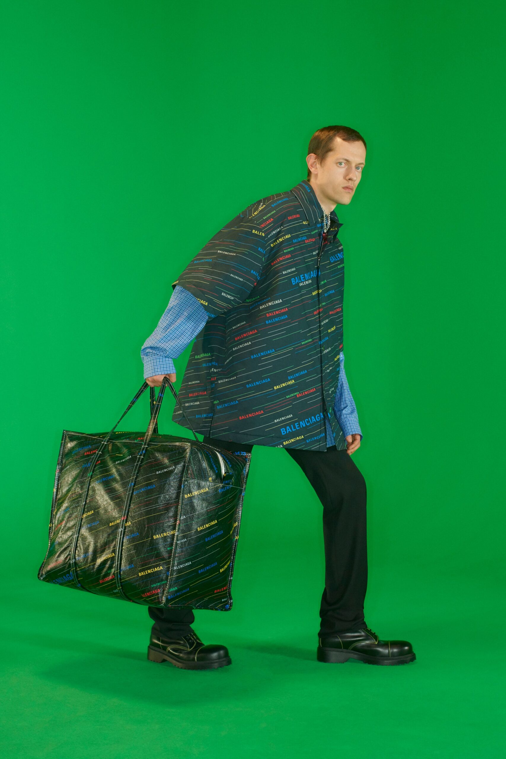 multi-colored vinyl cape with relaxed shirt