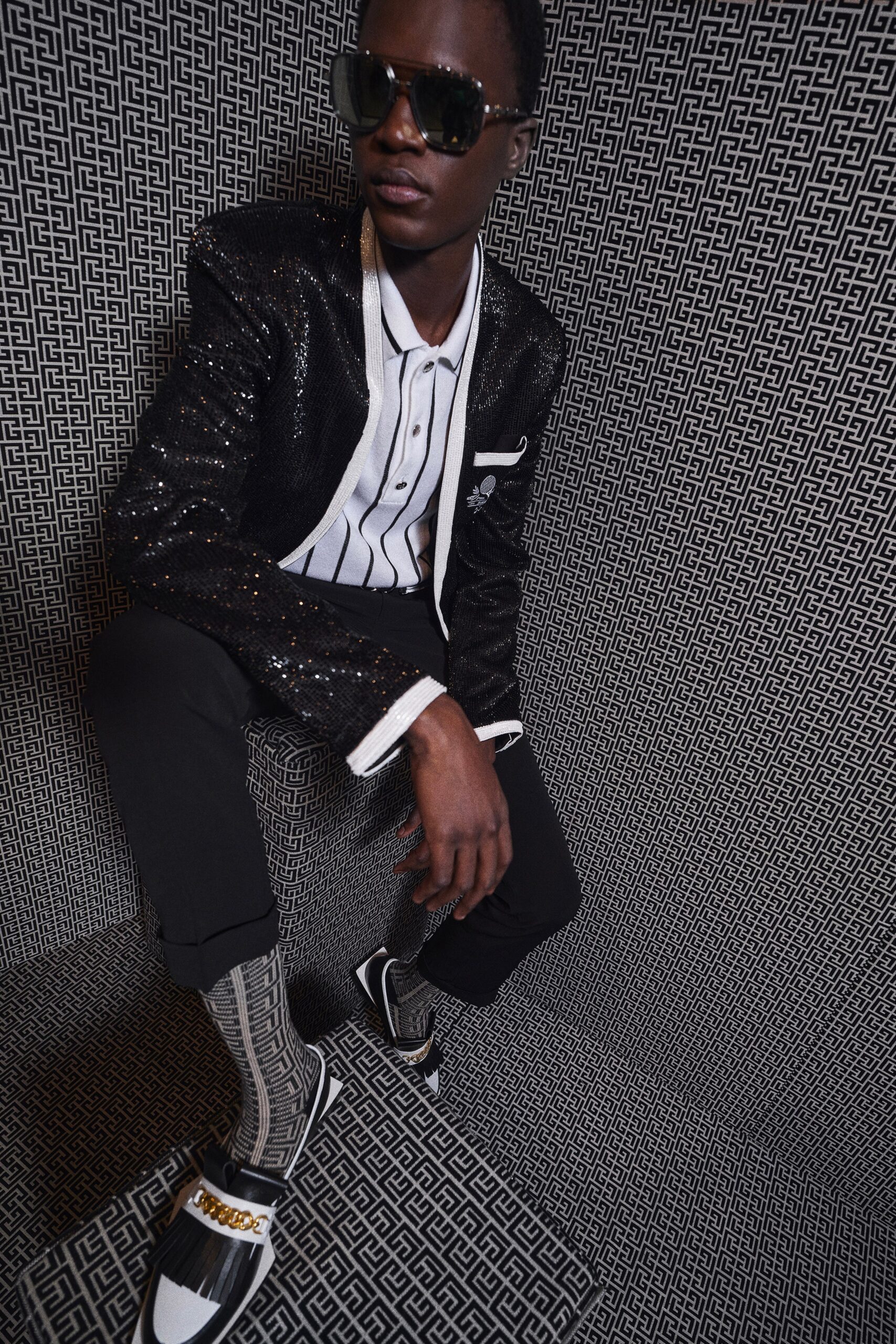 black sequined blazer with striped shirt