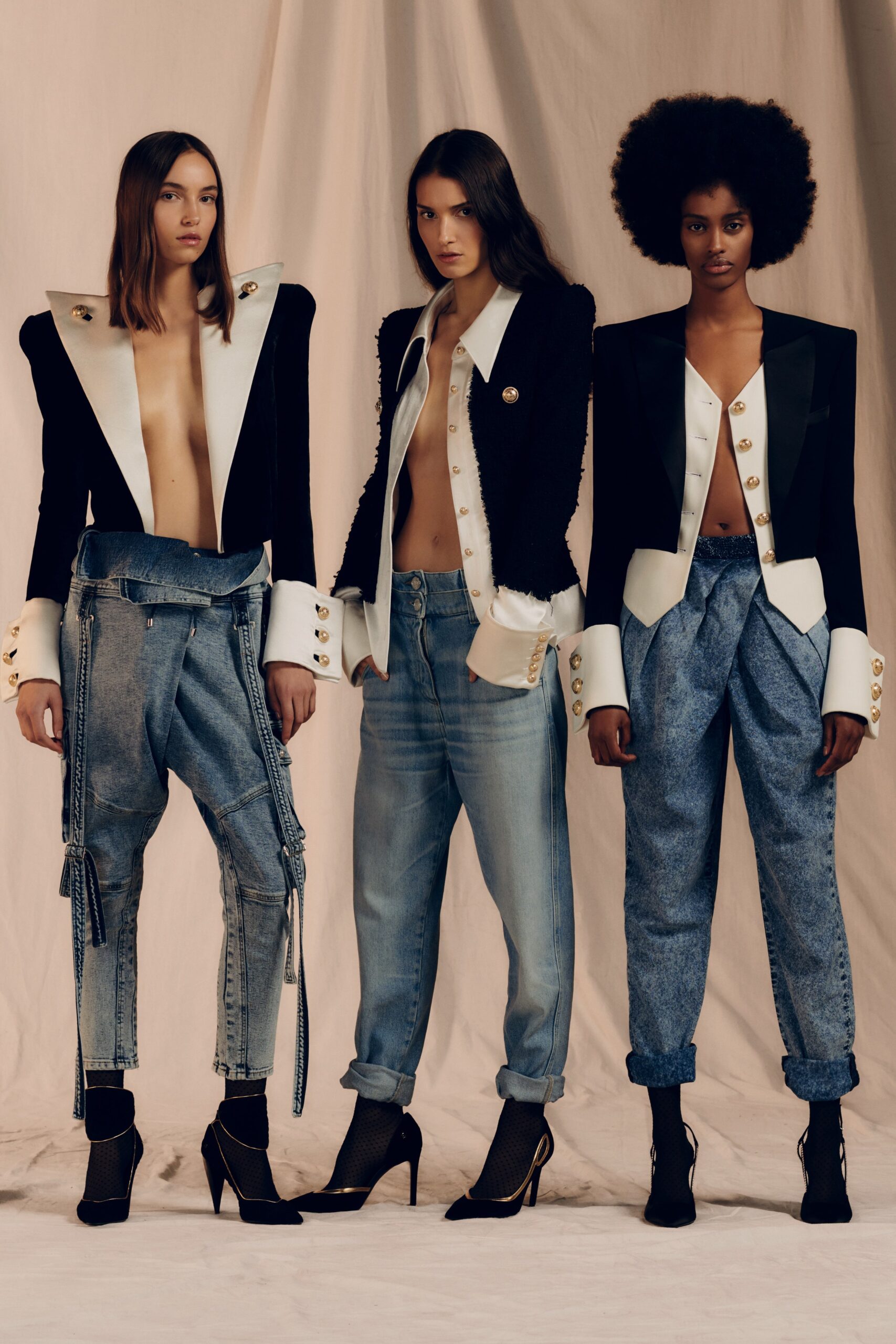 black and white structured blazer with relaxed denim pants