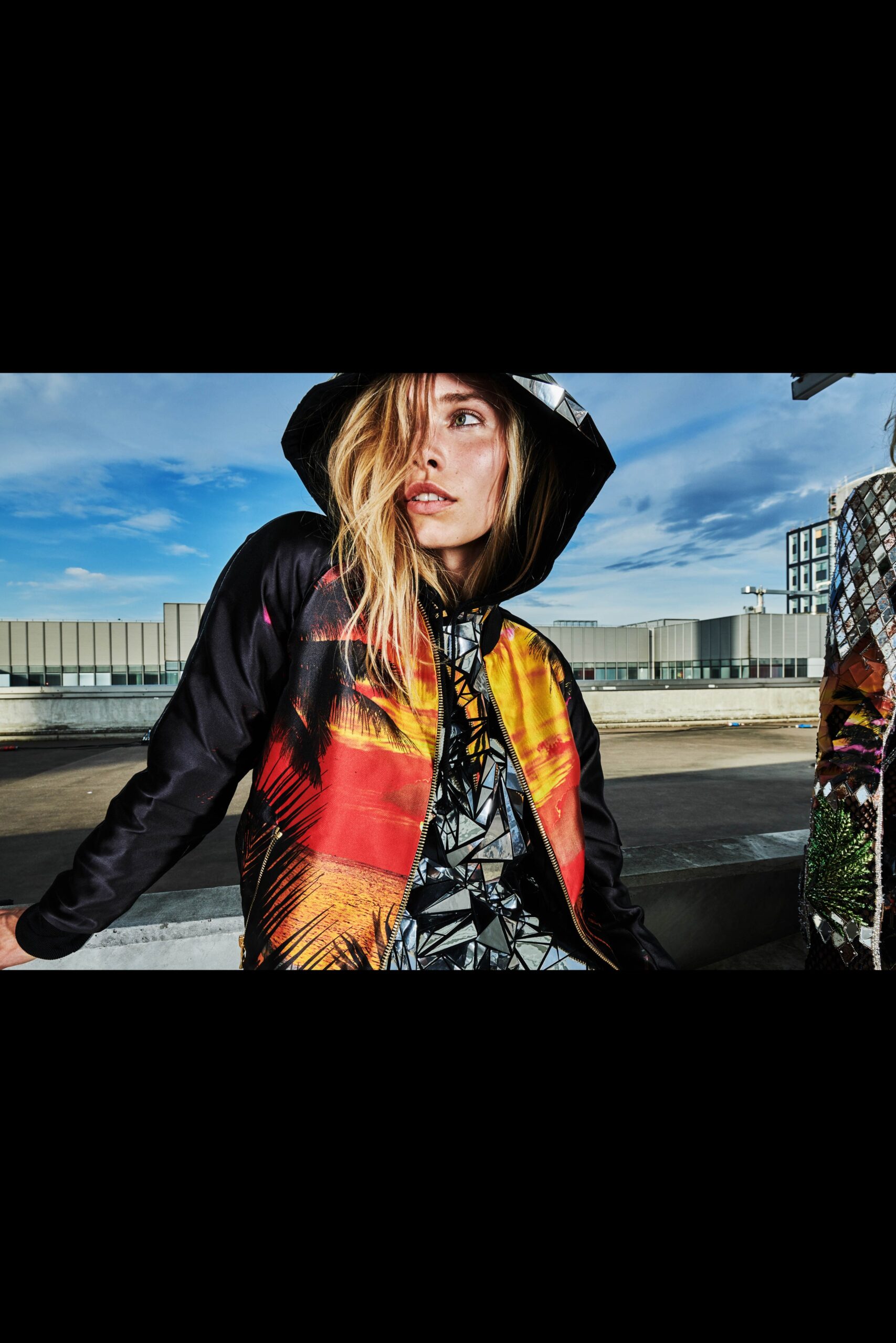 black printed jacket and geometric top