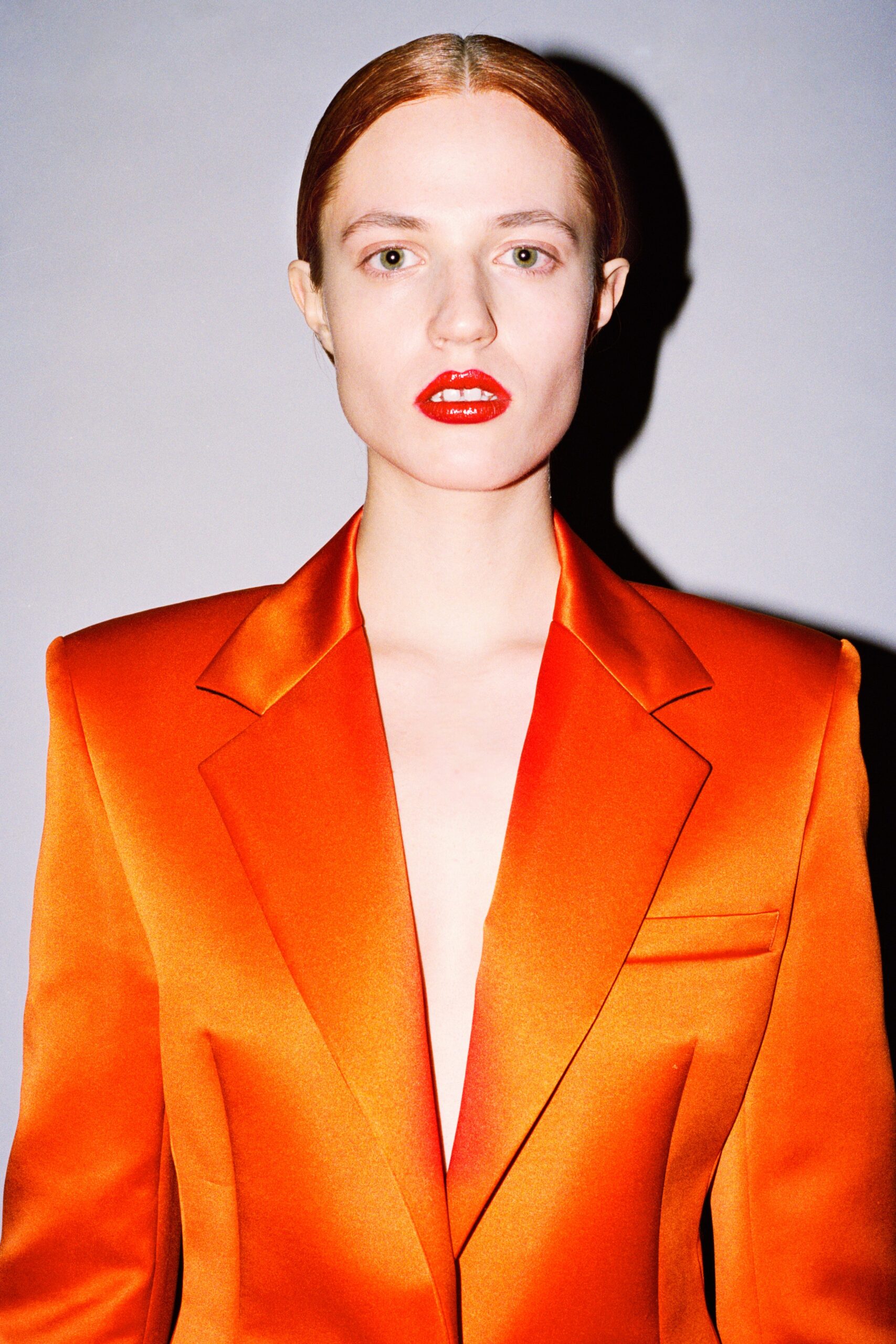 fitted orange satin blazer