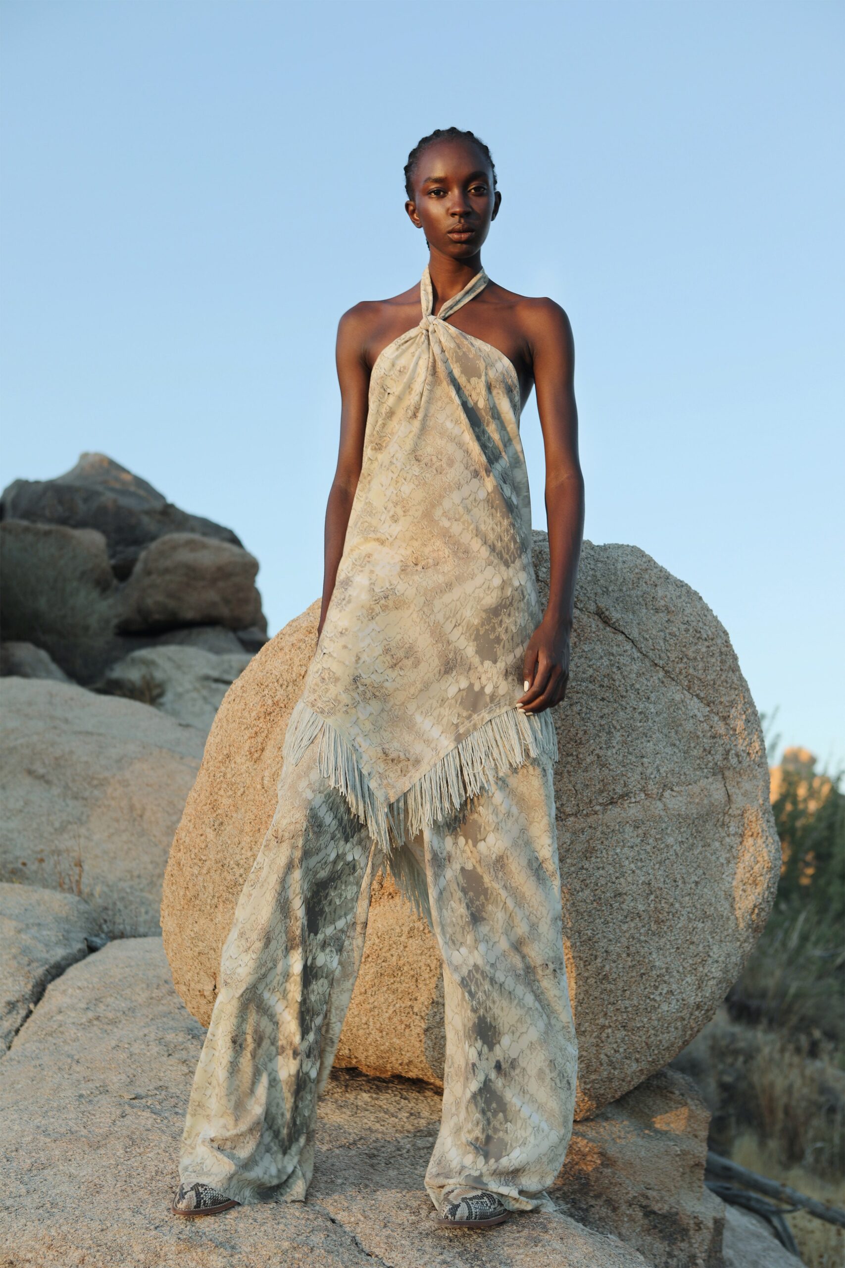 beige silk halter dress with fringed pants