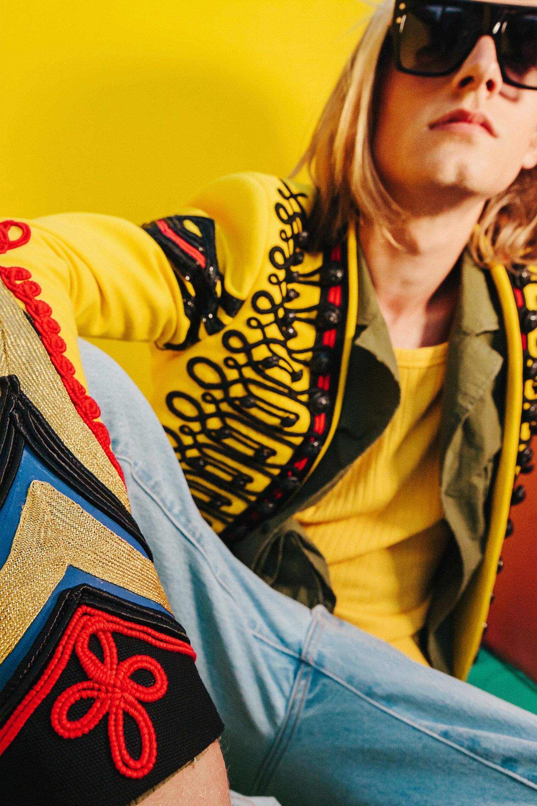 yellow embroidered jacket with denim pants