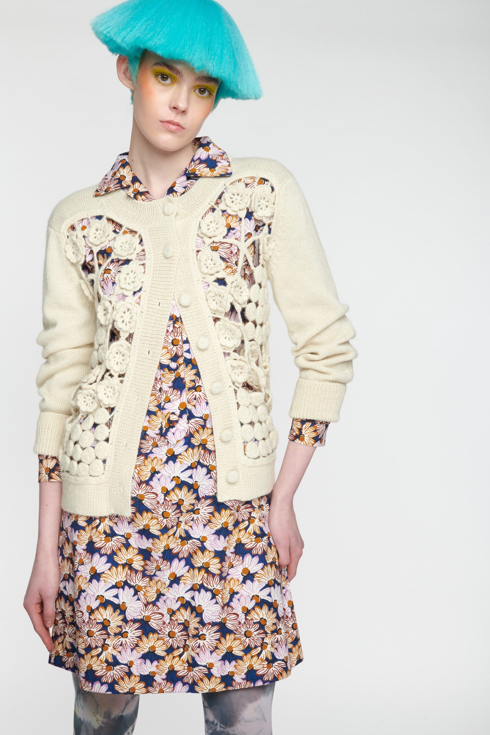 white crochet cardigan and floral dress