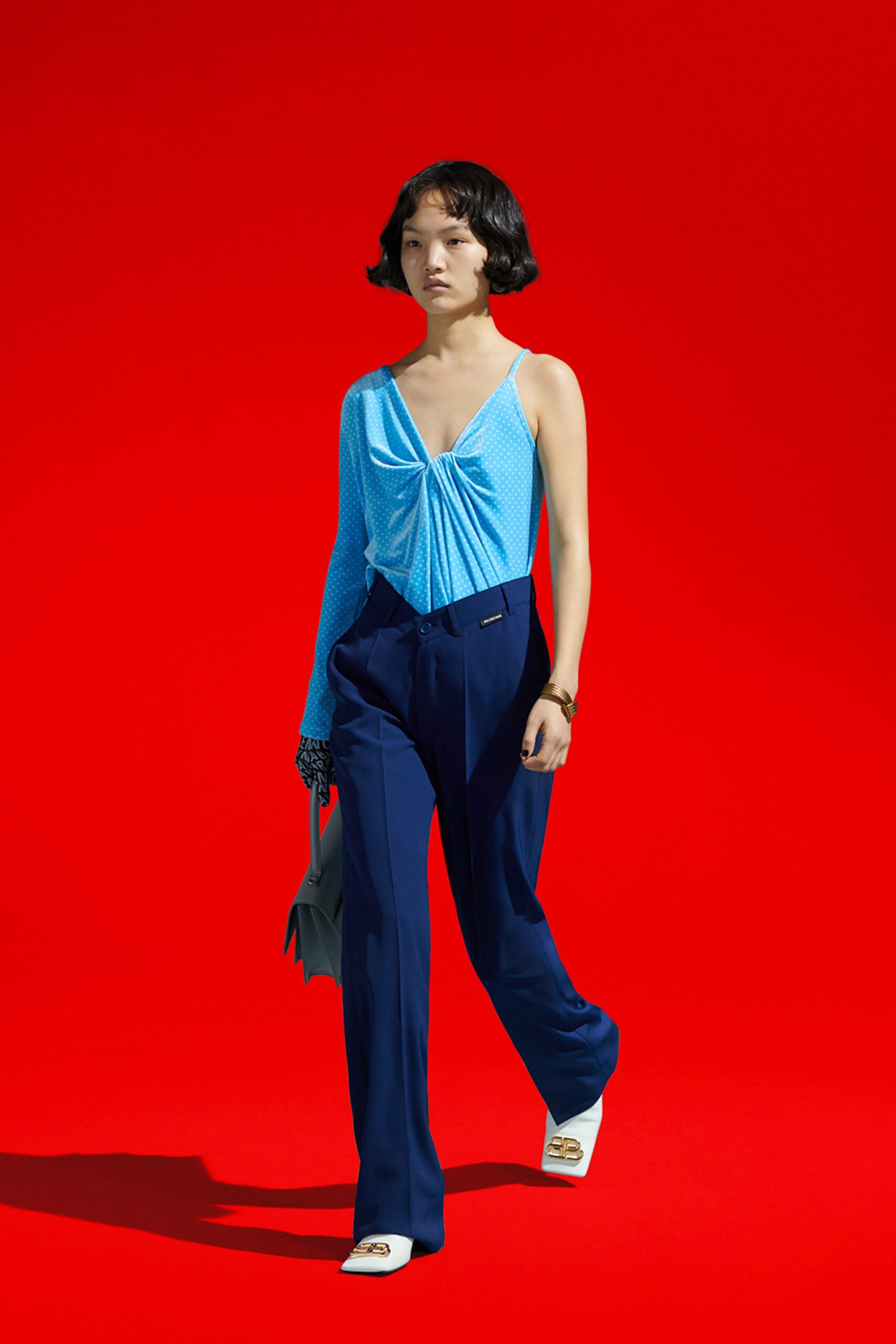 blue silk top and tailored pants