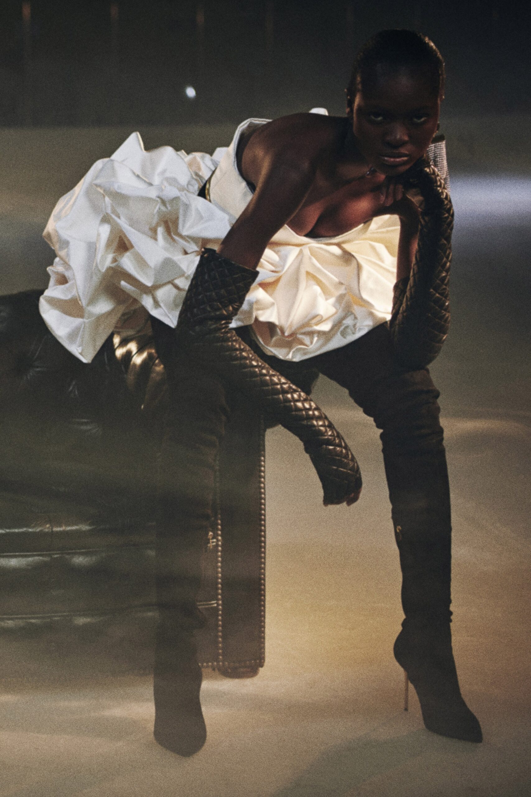 white pleated mini dress with black boots