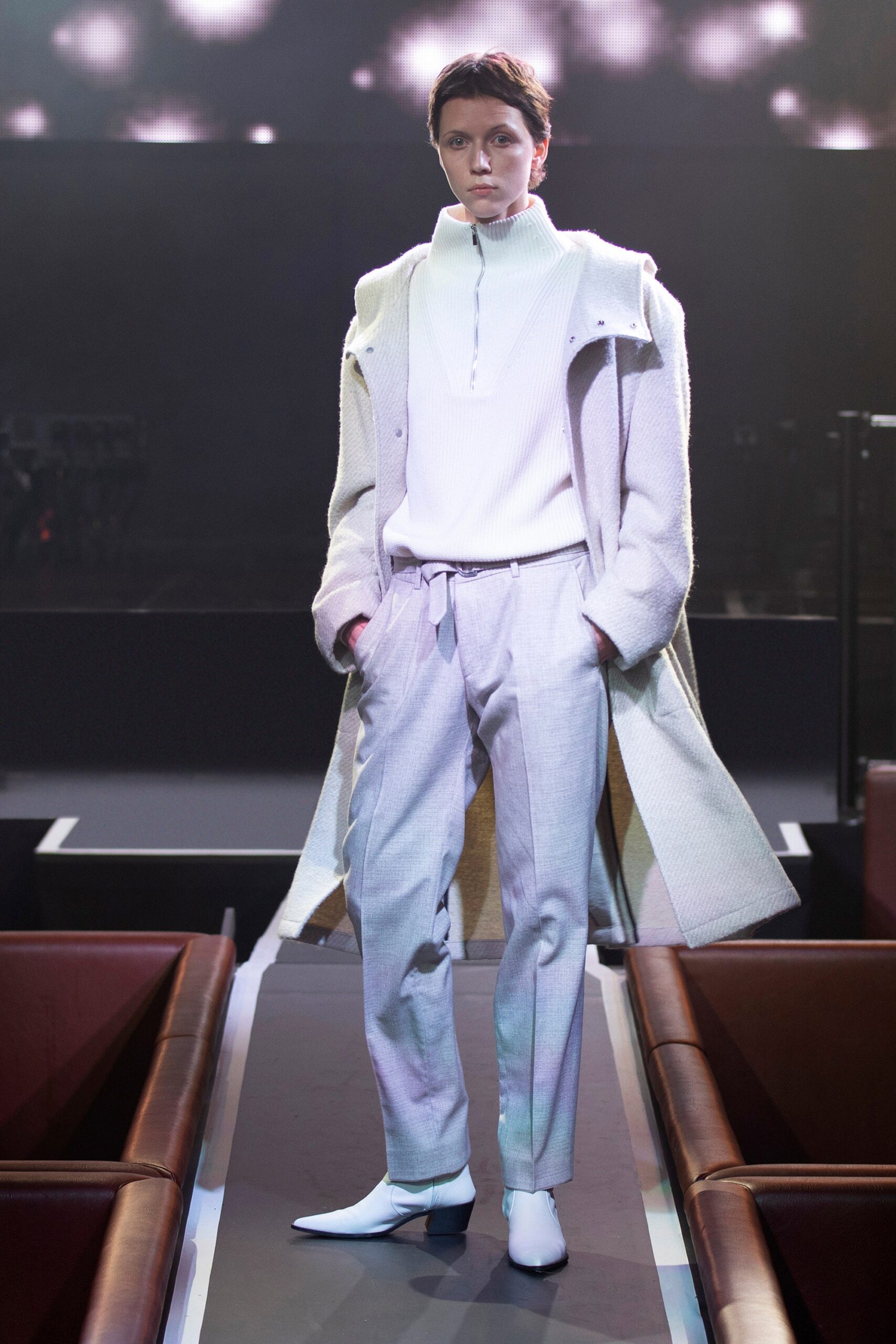 white wool coat with gray pants