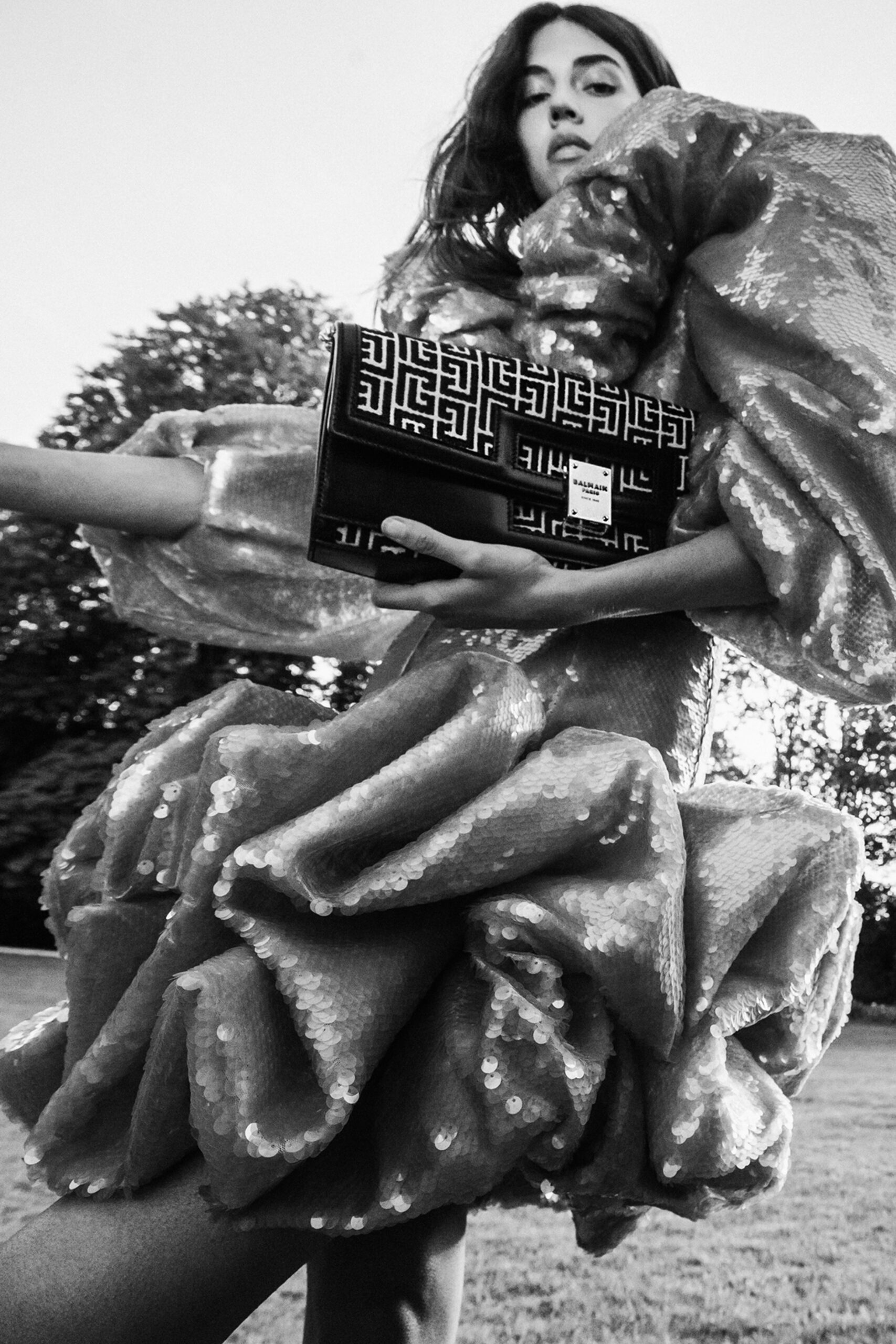 black sequined ruffled midi dress