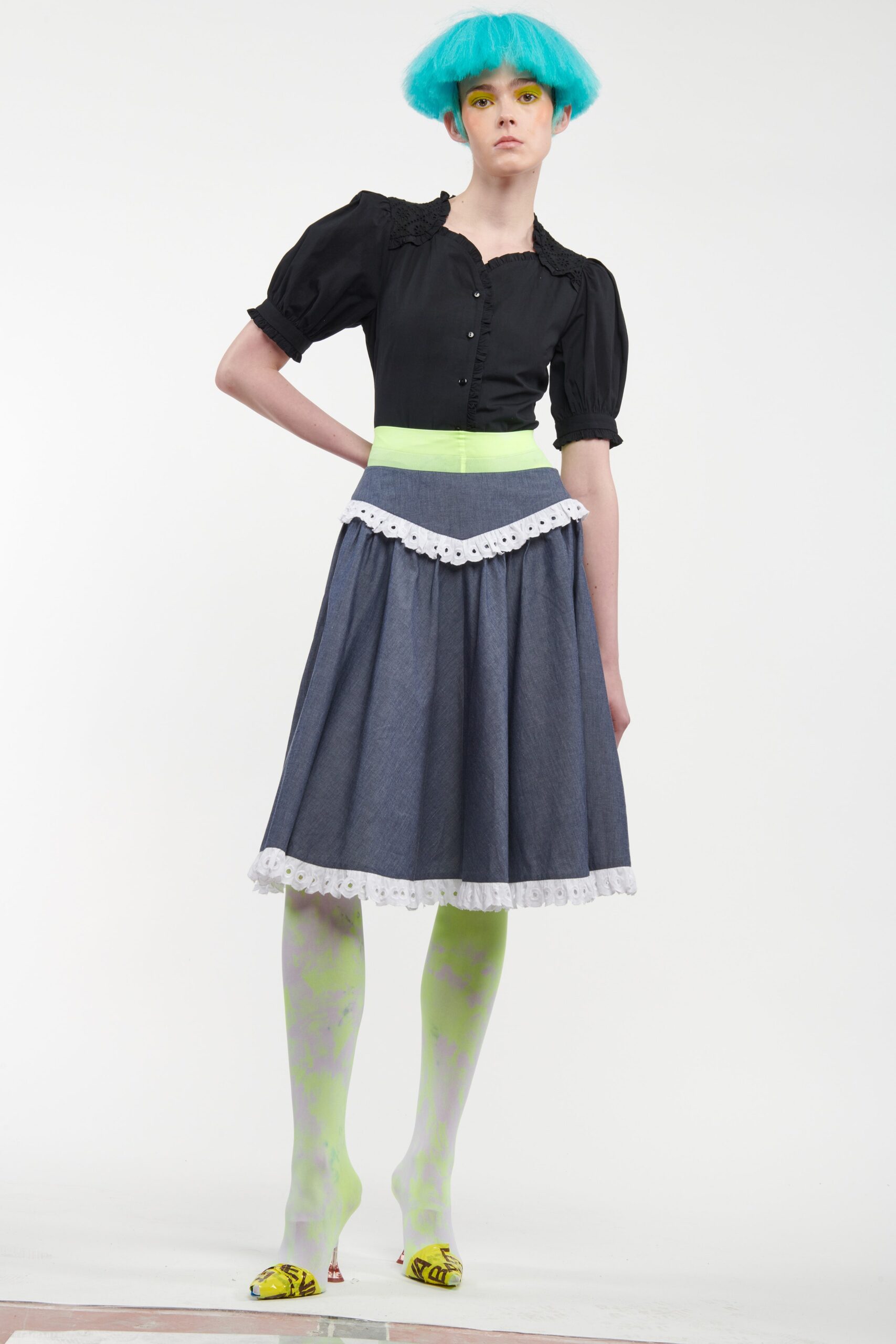 black blouse and blue denim skirt