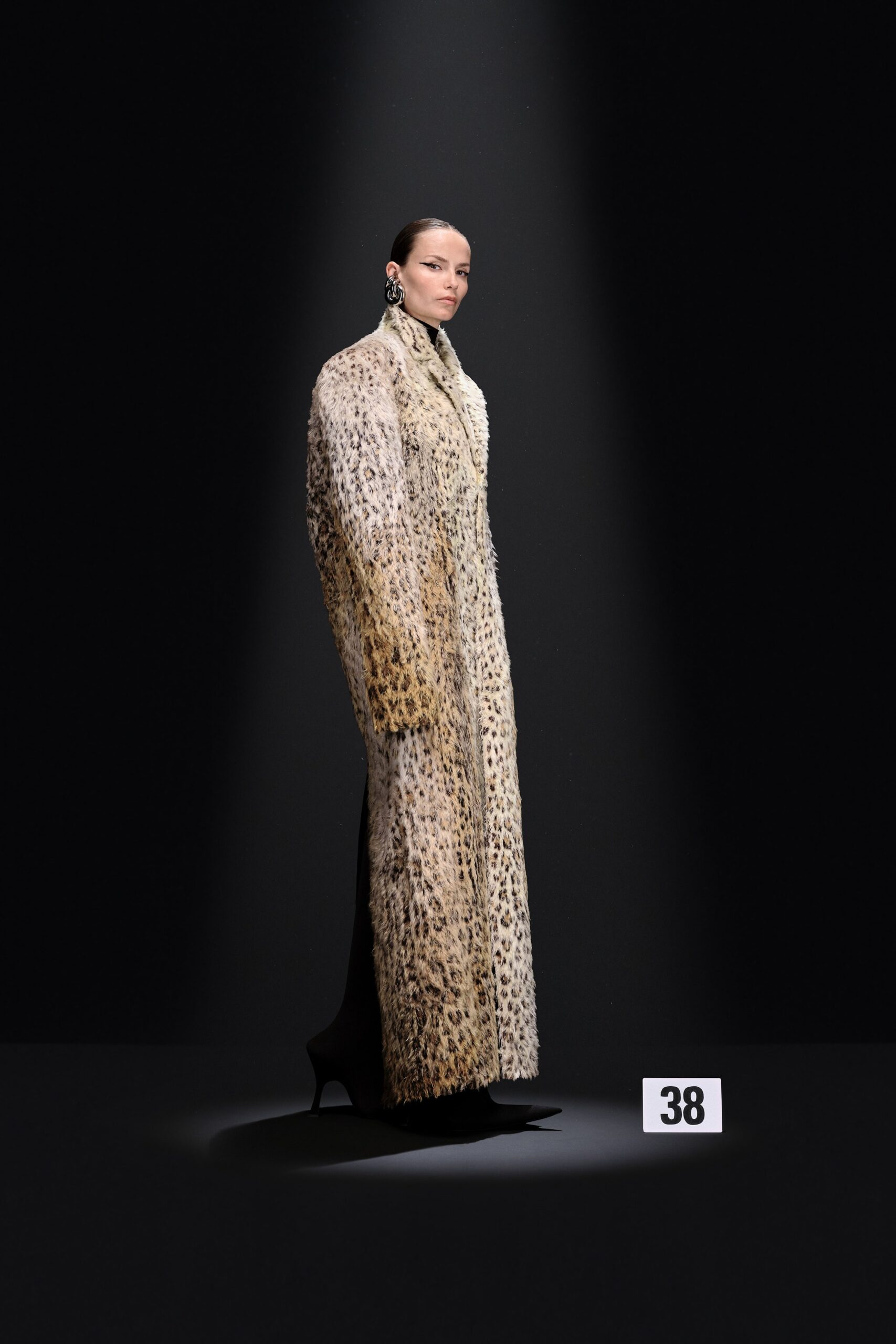 beige animal-print fur coat and black dress