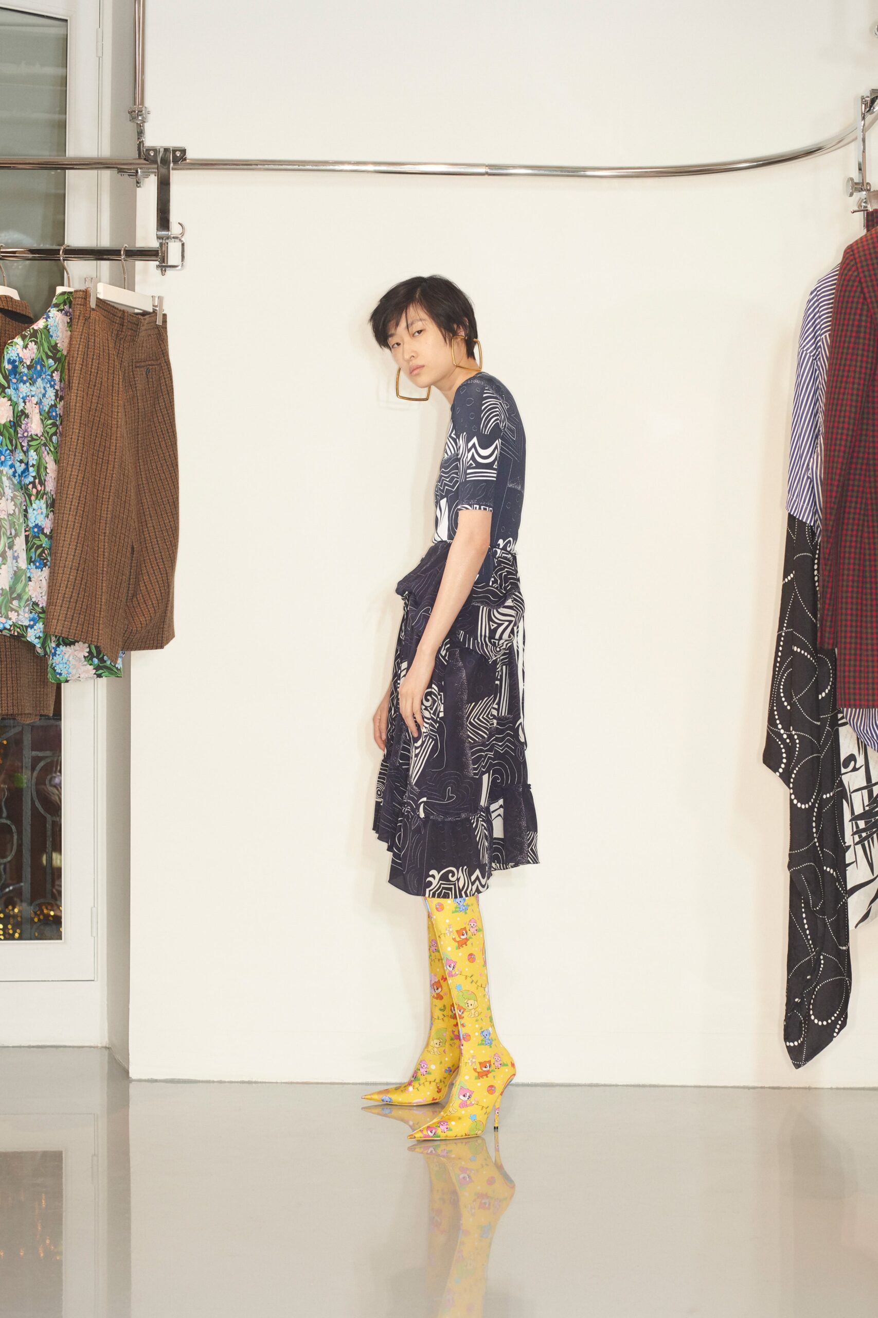 blue and white tiered midi dress with yellow boots