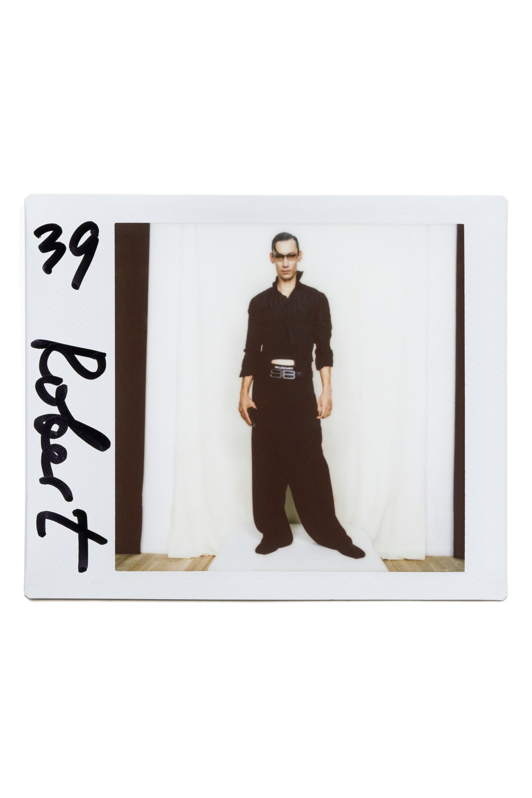 black fitted shirt and relaxed pants