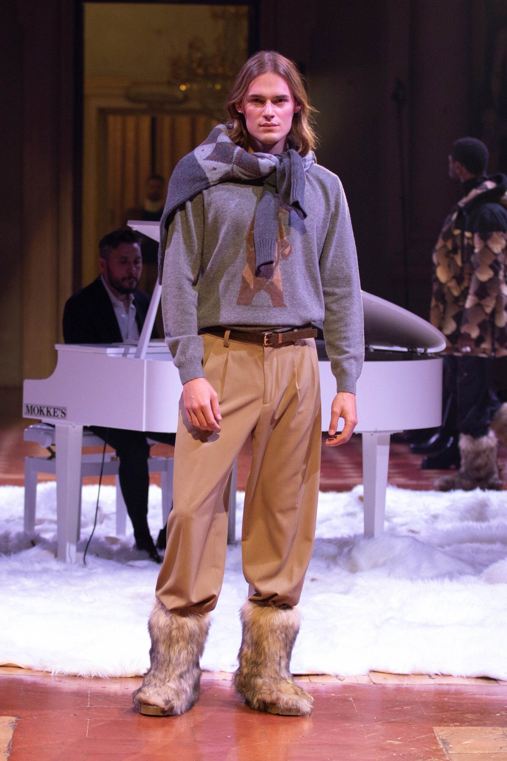 gray wool sweater with beige pants