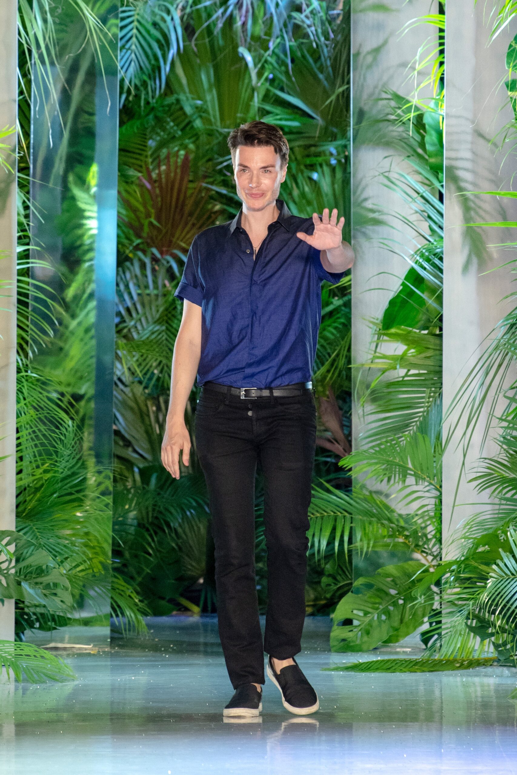 blue fitted shirt with black pants