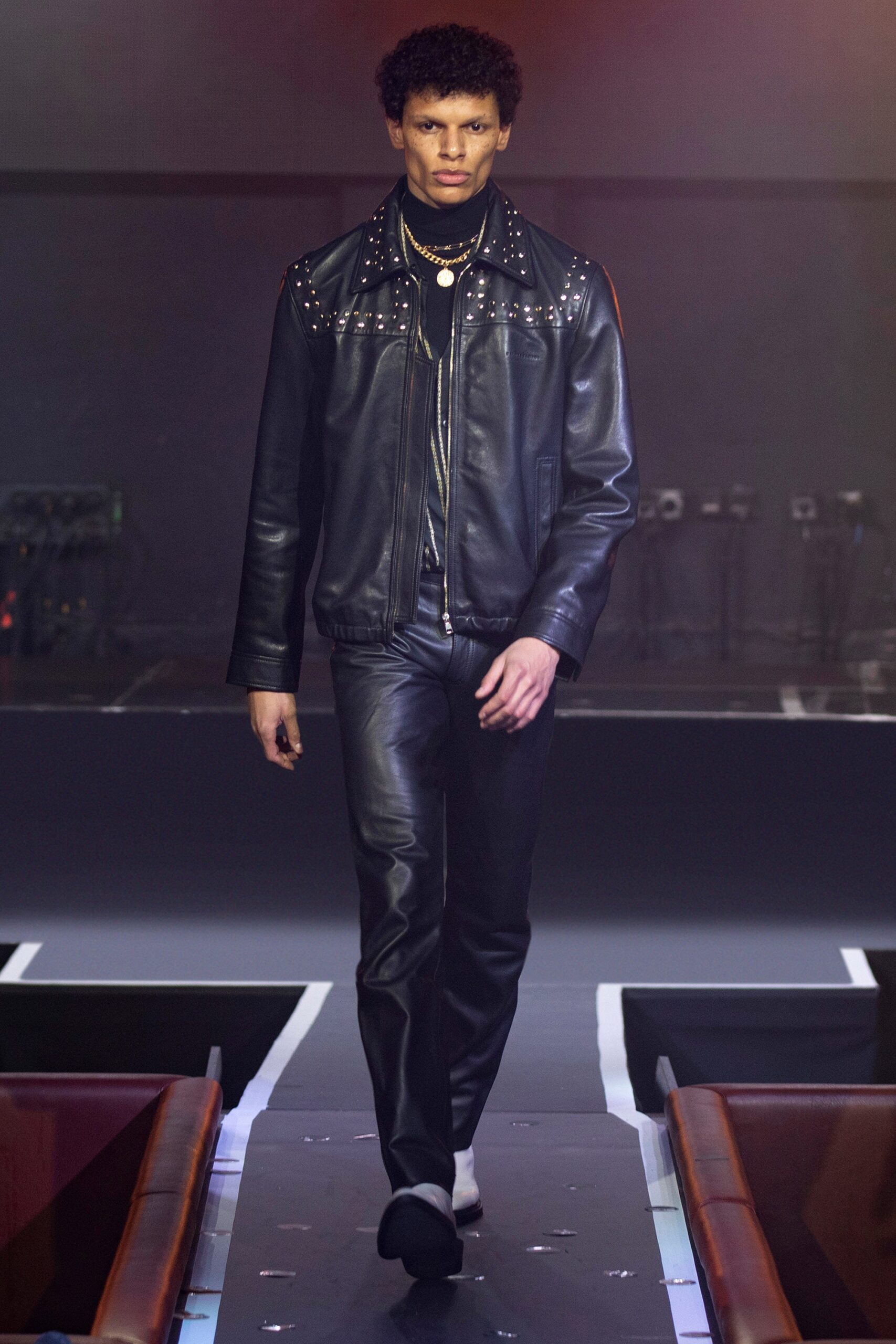 black leather fitted jacket and pants