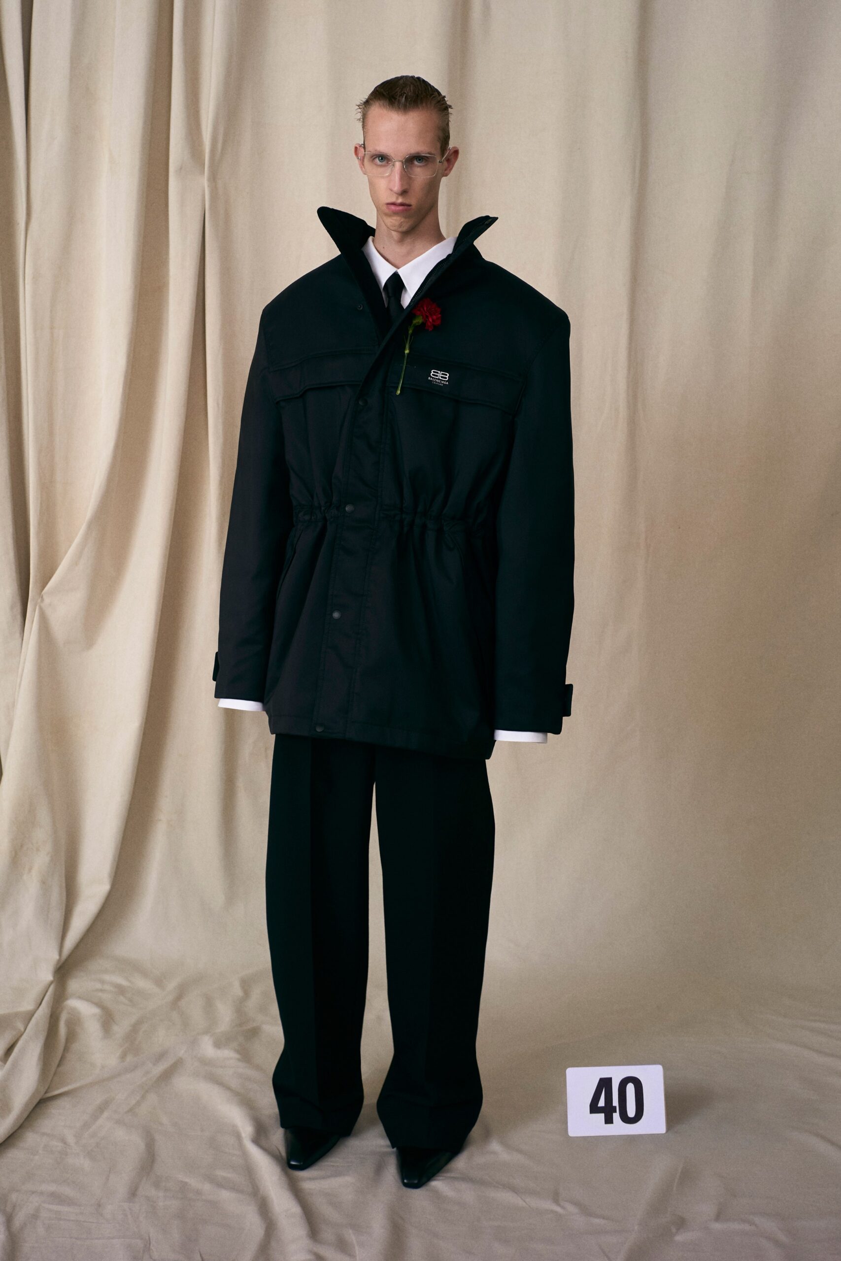 black cotton long-sleeve collared relaxed zippered pockets coat