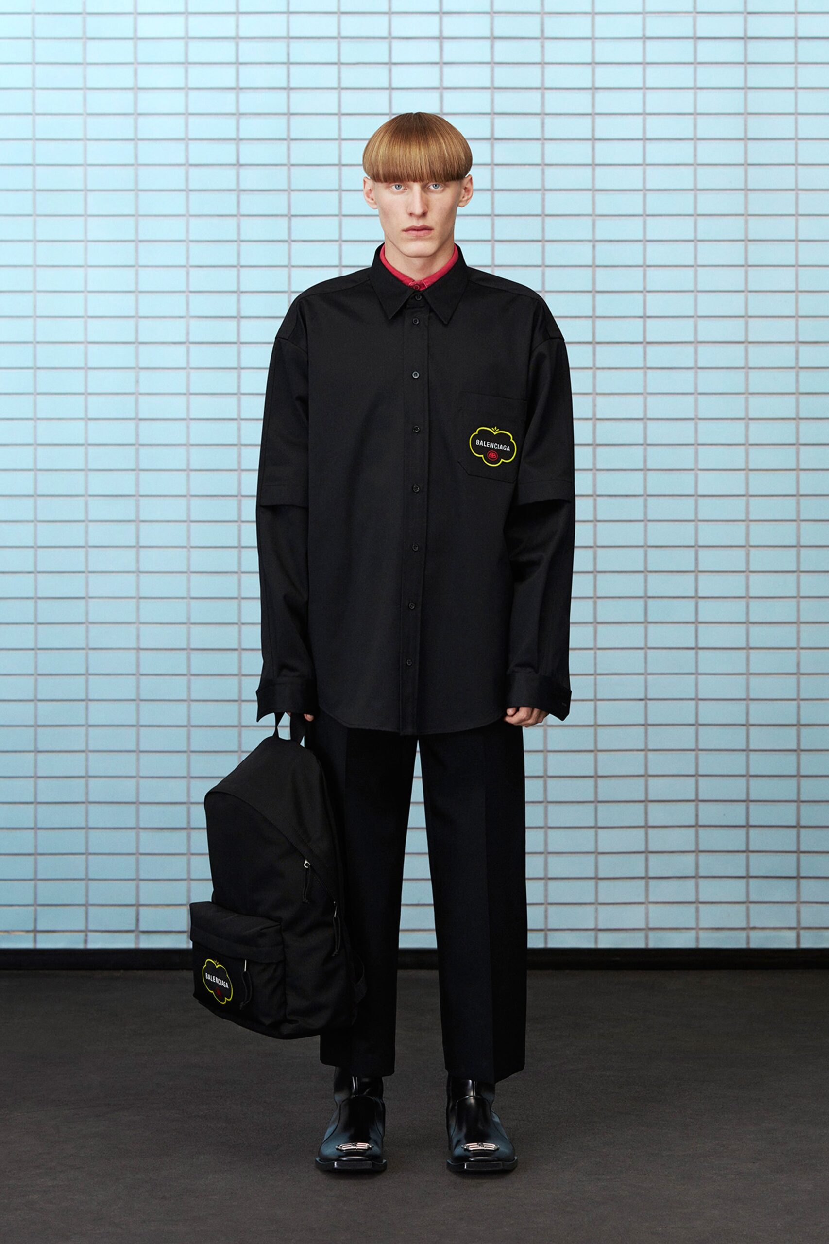oversized black shirt with tailored pants