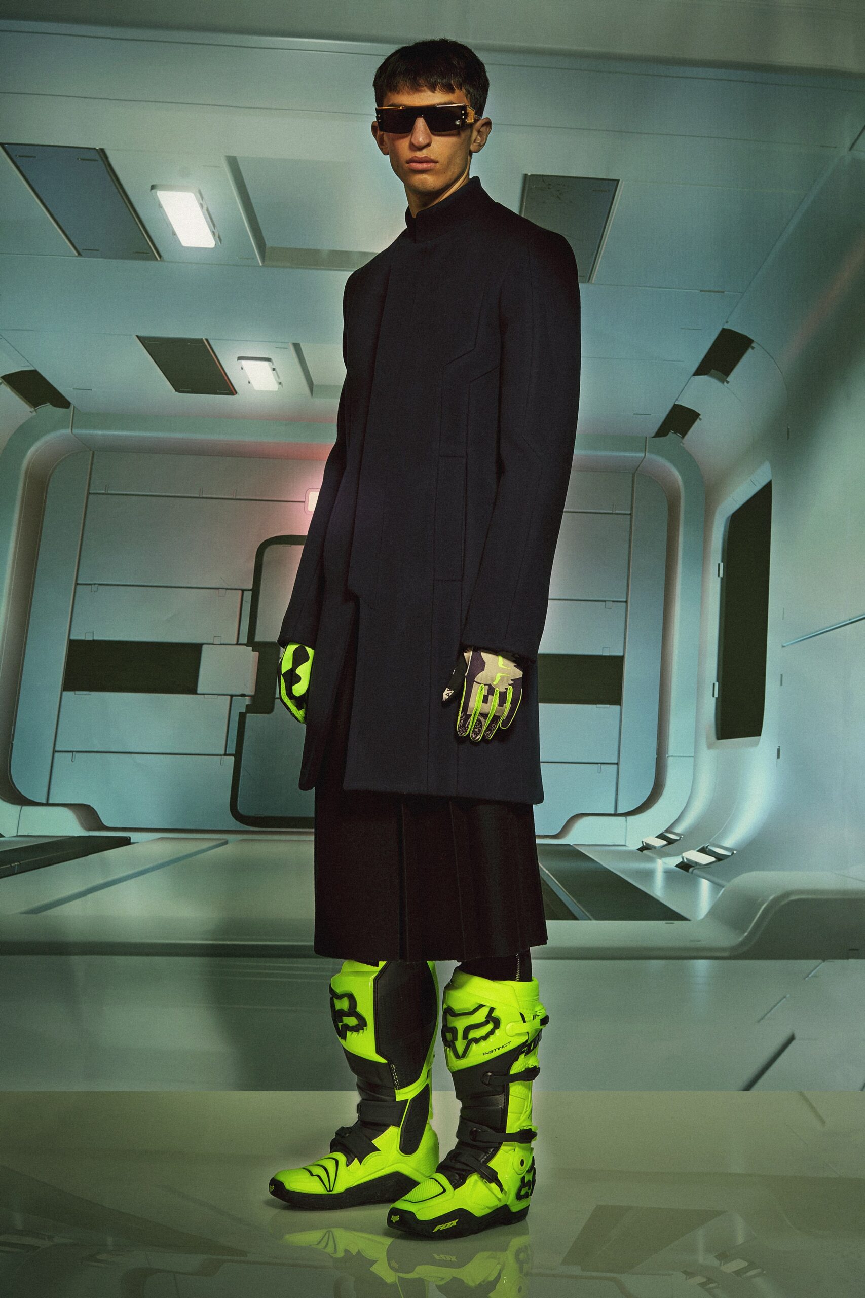 black fitted coat with neon shoes